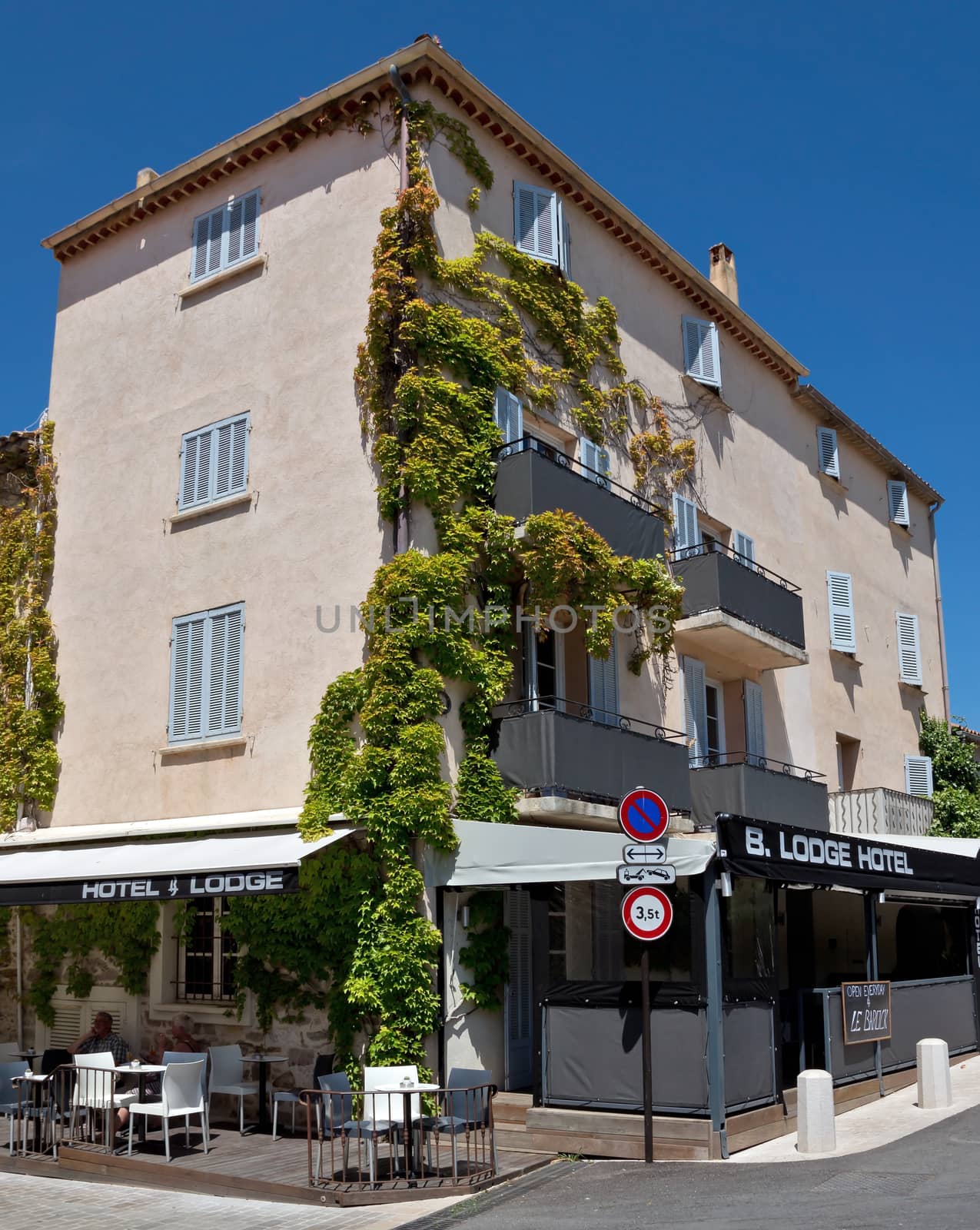 SAINT TROPEZ, FRANCE - JUNE 5, 2014: Architecture of Saint Tropez city in French Riviera, France.

Saint Tropez, France - June 5, 2014: Architecture of Saint Tropez city in French Riviera, France. People are resting.