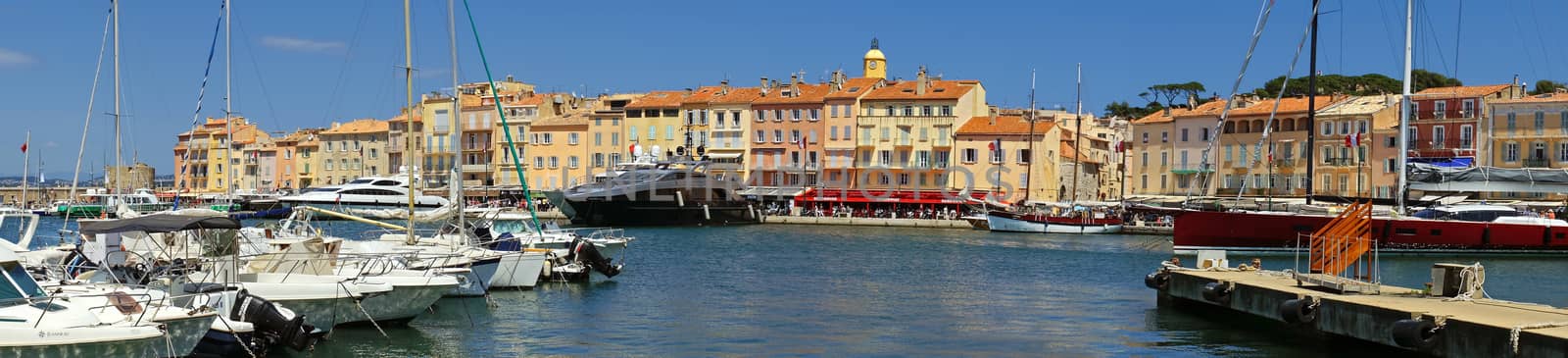 SAINT TROPEZ, FRANCE - JUNE 5: Panoramic view of the city of Saint Tropez on June 5, 2014 in Saint Tropez, France. An overview of the glamorous city of Saint Tropez on the cote d'azur. 

Saint Tropez, France - June 5, 2014: Panoramic view of the city of Saint Tropez. An overview of the glamorous city of Saint Tropez on the cote d'azur.
