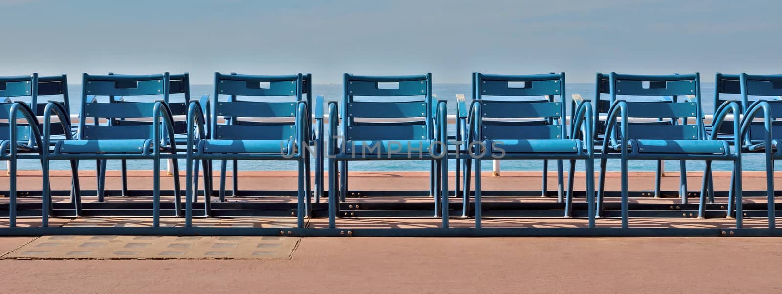 Deck Chairs in front of the sea, Nice, France.