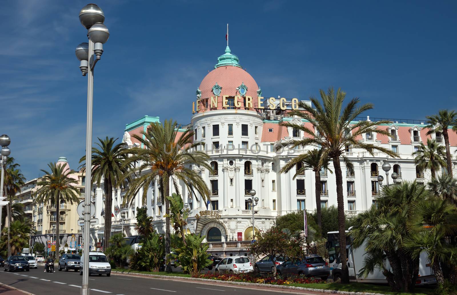 NICE, FRANCE - JUNE 6, 2014: Luxury Hotel Negresco on English Promenade in Nice, French Riviera. Hotel Negresco is the famous luxury hotel on the Promenade des Anglais in Nice, a symbol of the Cote d'Azur.

Nice, France - June 6, 2014: Luxury Hotel Negresco on English Promenade in Nice, French Riviera. Hotel Negresco is the famous luxury hotel on the Promenade des Anglais in Nice, a symbol of the Cote d'Azur.
