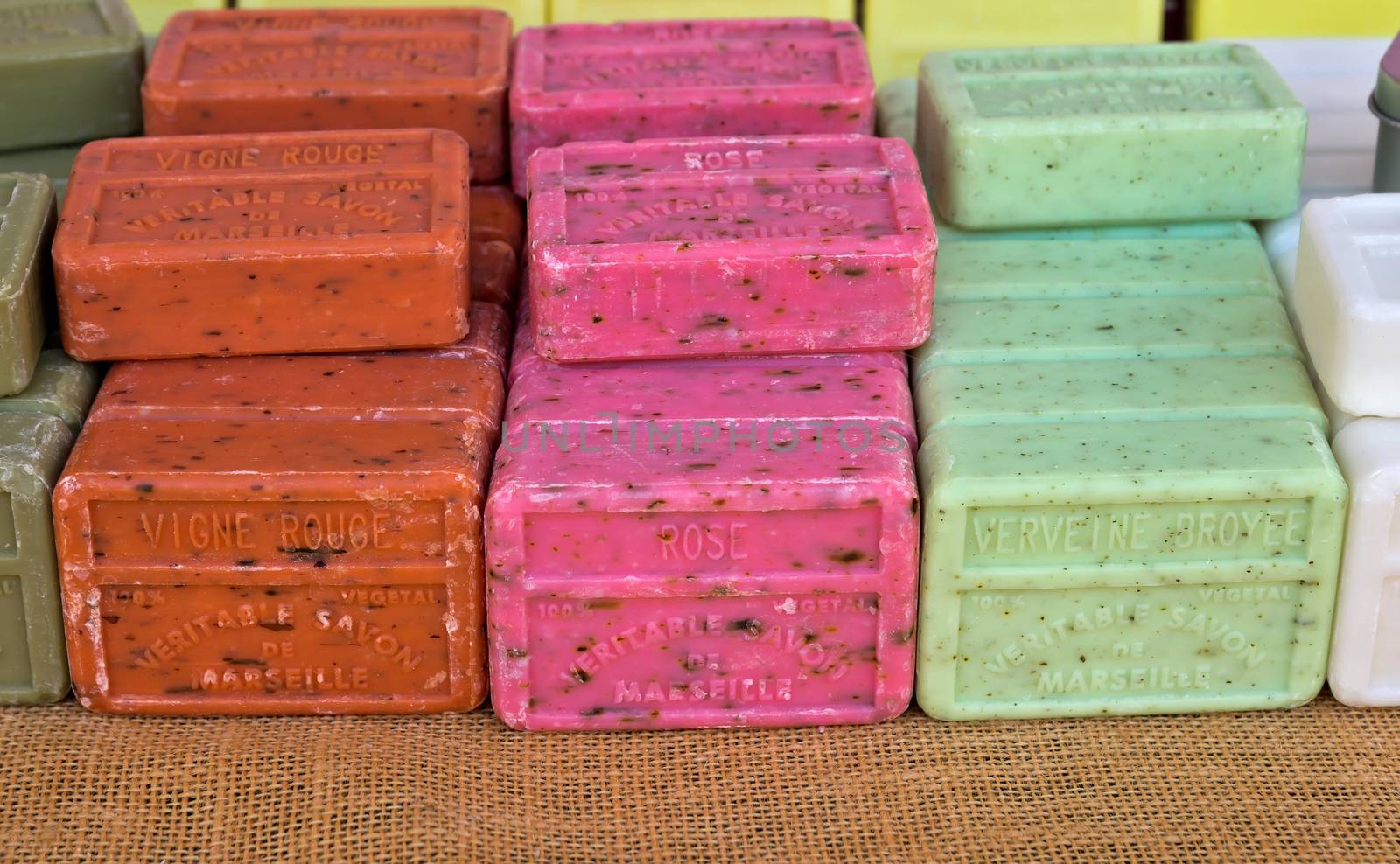 NICE, FRANCE - JUNE 8, 2014: Different flavored bars of soap from Marseille on a farmer's market.

Nice, France - June 8, 2014: Different flavored bars of soap from Marseille on a farmer's market.