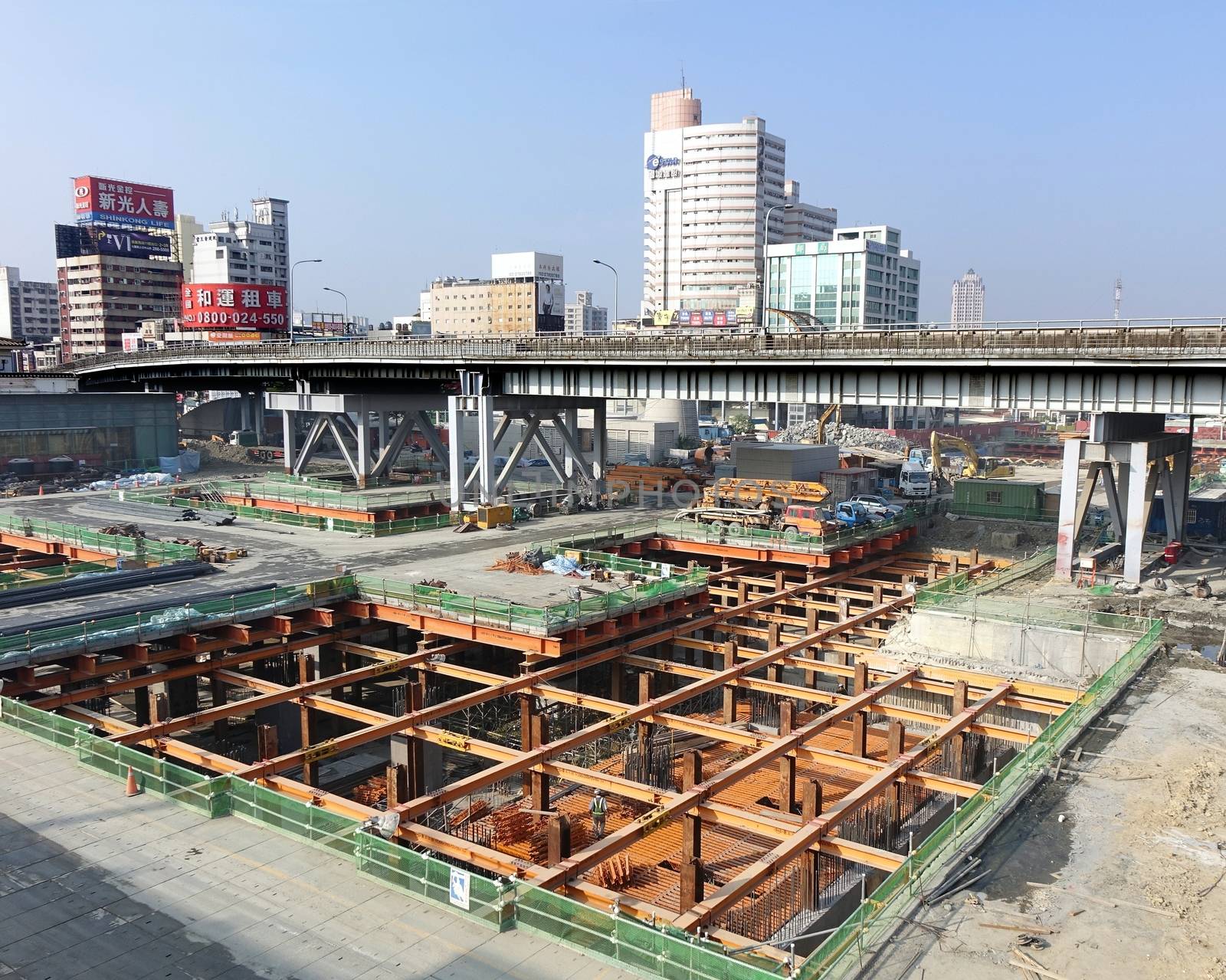 KAOHSIUNG, TAIWAN -- NOVEMBER 2, 2014:  A large underground construction project outside Kaohsiung Railway Station, that is part of the new light rail system.