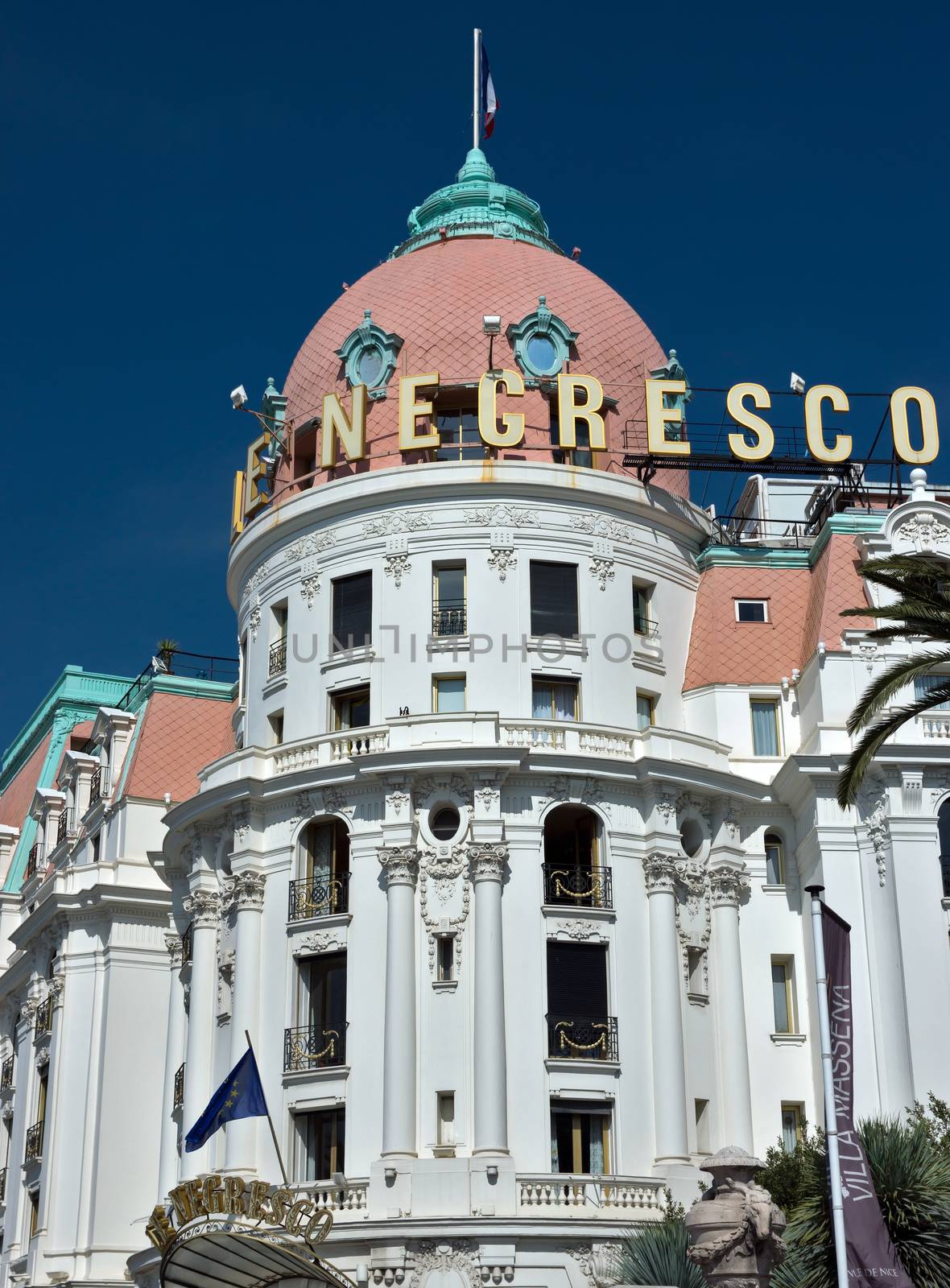 NICE, FRANCE - JUNE 6, 2014: Luxury Hotel Negresco on English Promenade in Nice, French Riviera. Hotel Negresco is the famous luxury hotel on the Promenade des Anglais in Nice.

Nice, France - June 6, 2014: Luxury Hotel Negresco on English Promenade in Nice, French Riviera. Hotel Negresco is the famous luxury hotel on the Promenade des Anglais in Nice, a symbol of the Cote d'Azur.