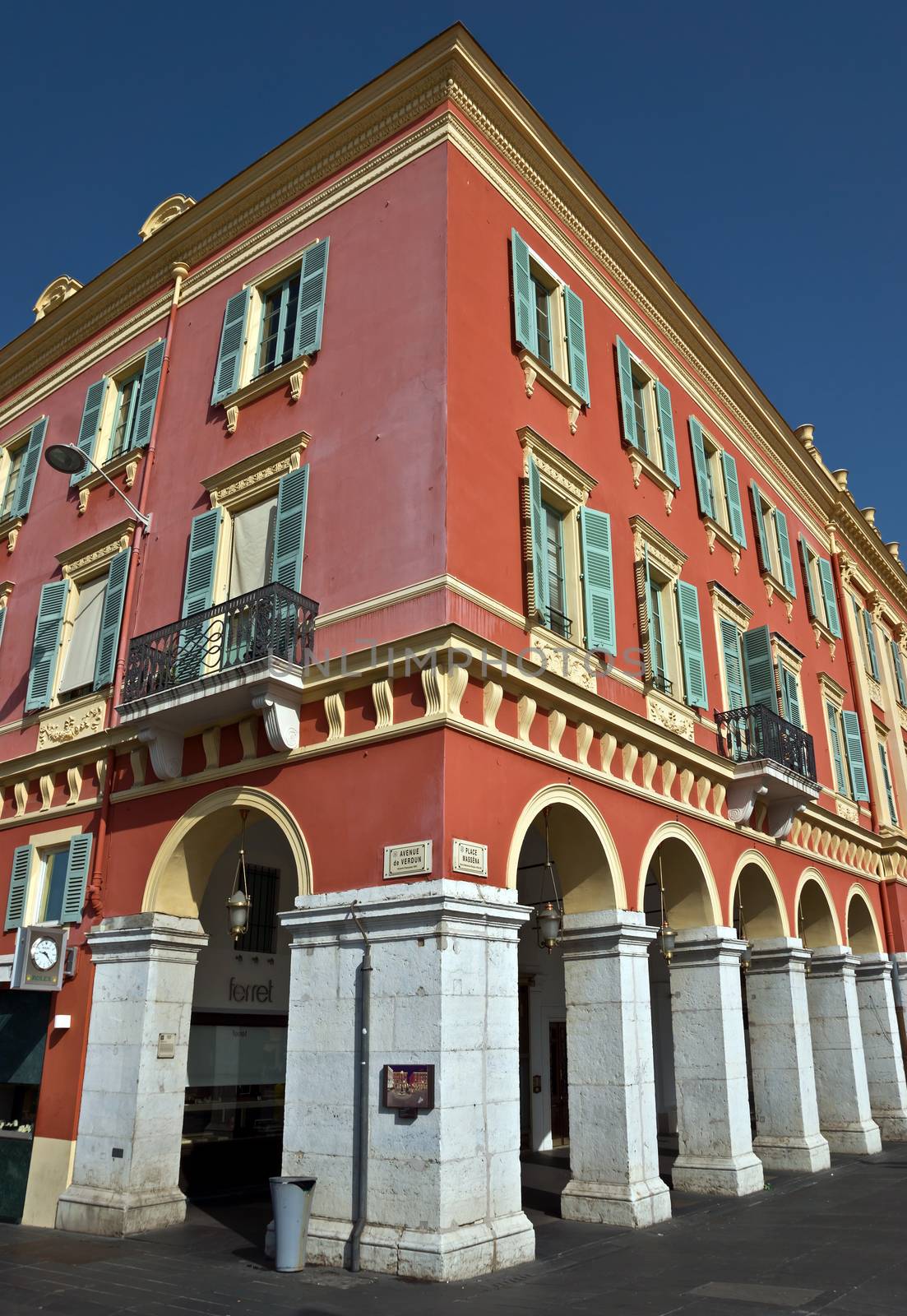 NICE, FRANCE - JUNE 8, 2014: Architecture of the Place Massena. Square is located in the city center and is the most popular destination among tourists. The square was reconstructed in 1979.

Nice, France - June 8, 2014: Architecture of the Place Massena. Square is located in the city center and is the most popular destination among tourists. The square was reconstructed in 1979. There are many boutiques, cafes and restaurants.