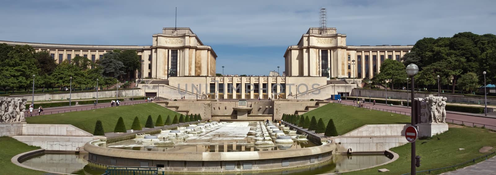 PARIS, FRANCE - JUNE 11, 2014: Palace - Palais de Chaillot. Was built in 1937 on a Hill of Trocadero.

Paris, France - June 11, 2014: Palace - Palais de Chaillot. Was built in 1937 on a Hill of Trocadero. People are walking on outdoors.