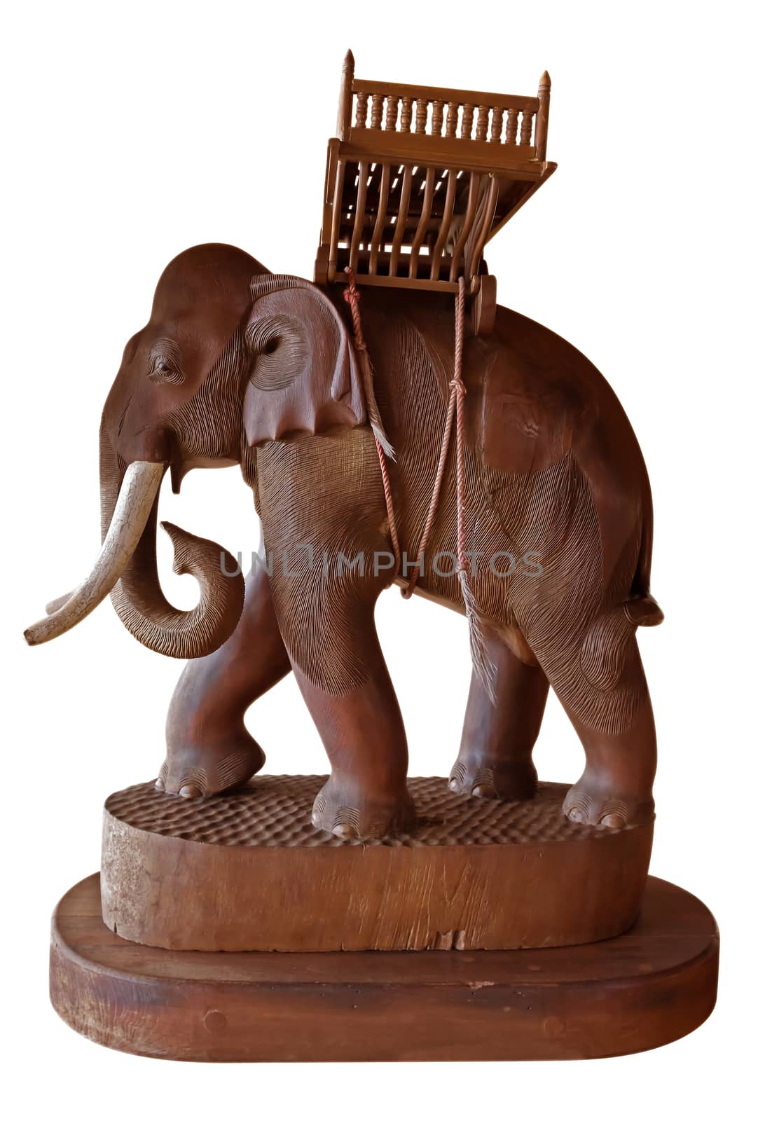 Wooden elephant figurine from Thailand. Clipping Path included. It is not exclusive and is sold as a souvenir.