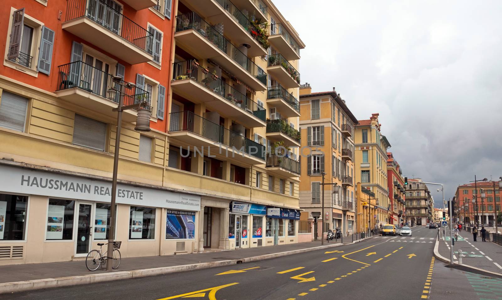 NICE, FRANCE - APRIL 27: Architecture along Promenade des Anglais on April 27, 2013 in Nice, France. It is a symbol of the Cote d'Azur and was built in 1830 at the expense of the British colony.

Nice, France - April 27, 2013: Architecture along Promenade des Anglais. Promenade des Anglais is a symbol of the Cote d'Azur and was built in 1830 at the expense of the British colony.
