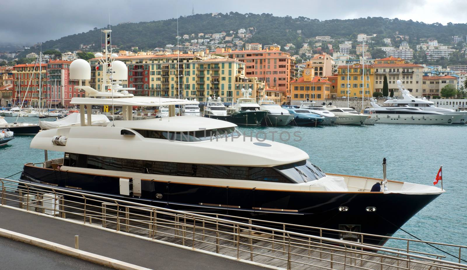 NICE, FRANCE - APRIL 27: Expensive yacht anchored within a Port de Nice on April 27, 2013 in Nice, France. Port de Nice was started in 1745.

Nice, France - April 27, 2013 : Expensive yacht anchored within a Port de Nice in French Riviera. Port de Nice was started in 1745.