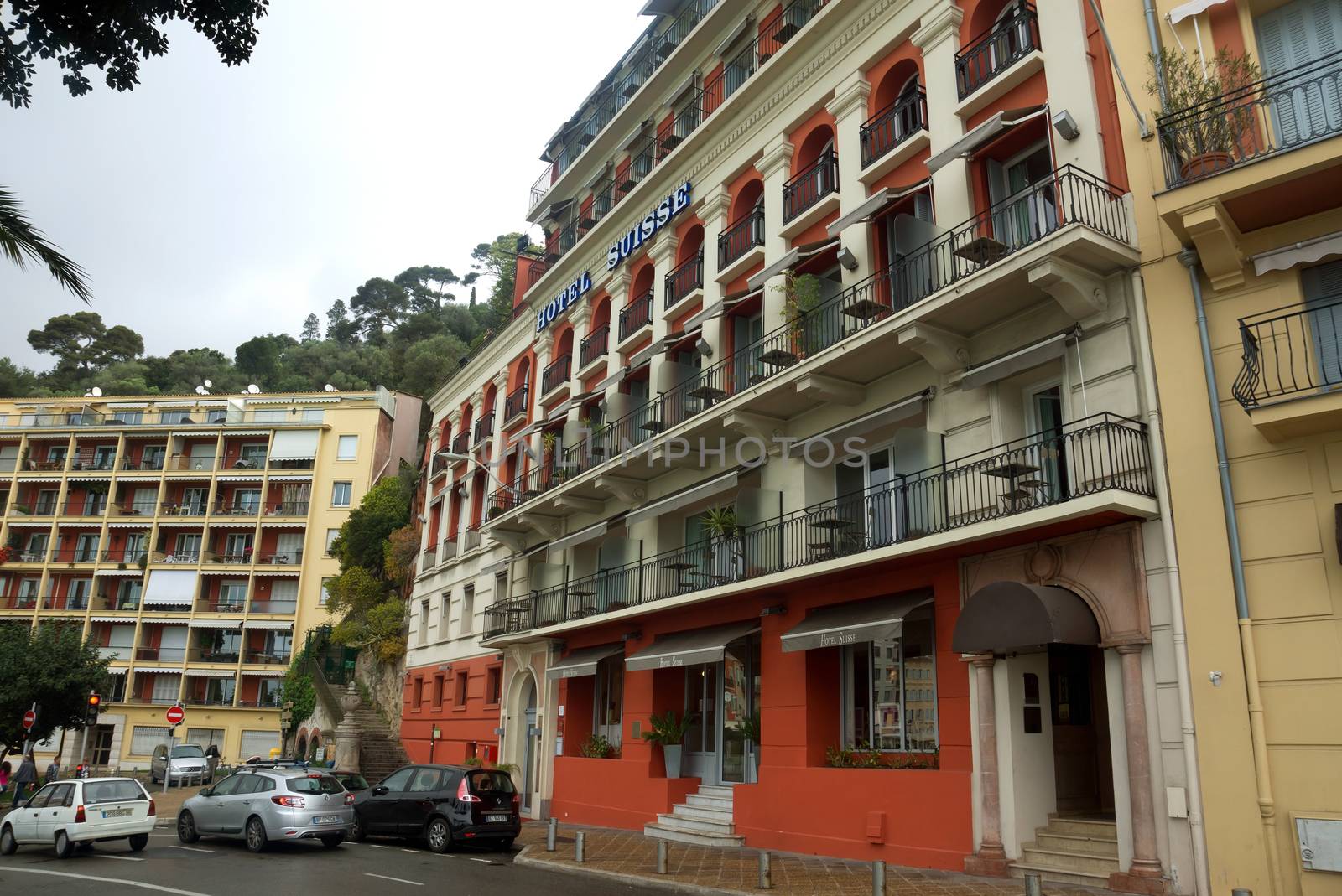 NICE, FRANCE - APRIL 27: Luxury Hotel Suisse on April 27, 2013 in Nice, France. Hotel Suisse set on the seafront in the historic district of Nice with exceptional views over the Baie des Anges and the Promenade des Anglais.

Nice, France - April 27, 2013: Luxury Hotel Suisse on English Promenade in Nice, French Riviera. Hotel Suisse set on the seafront in the historic district of Nice with exceptional views over the Baie des Anges and the Promenade des Anglais.