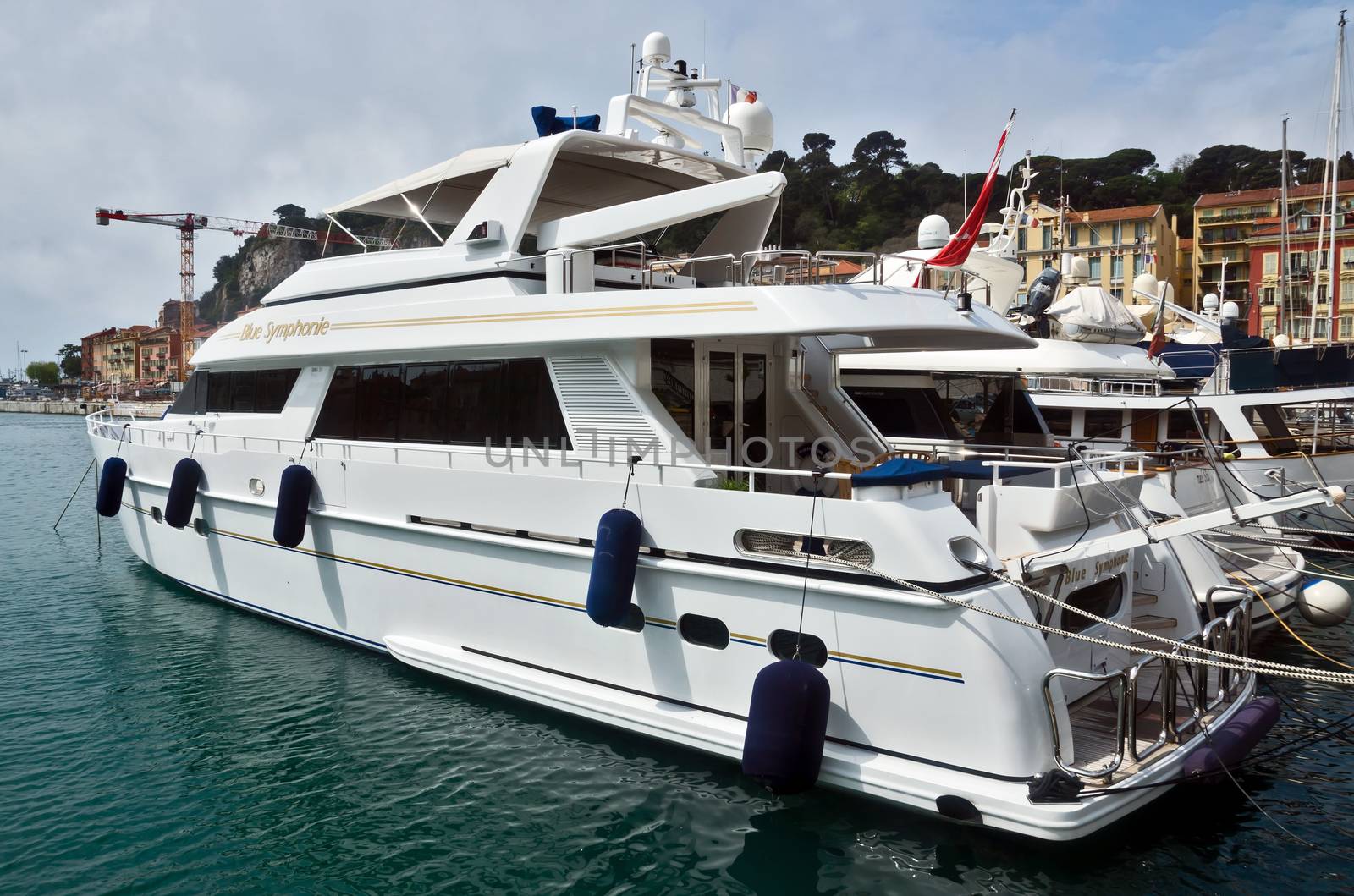 NICE, FRANCE - APRIL 27: A luxury yacht in the port of Port de Nice on April 27, 2013 in Nice, France. Port de Nice was started in 1745.

Nice, France - April 27, 2013: A luxury yacht in the port of Port de Nice in French Riviera. Port de Nice was started in 1745.