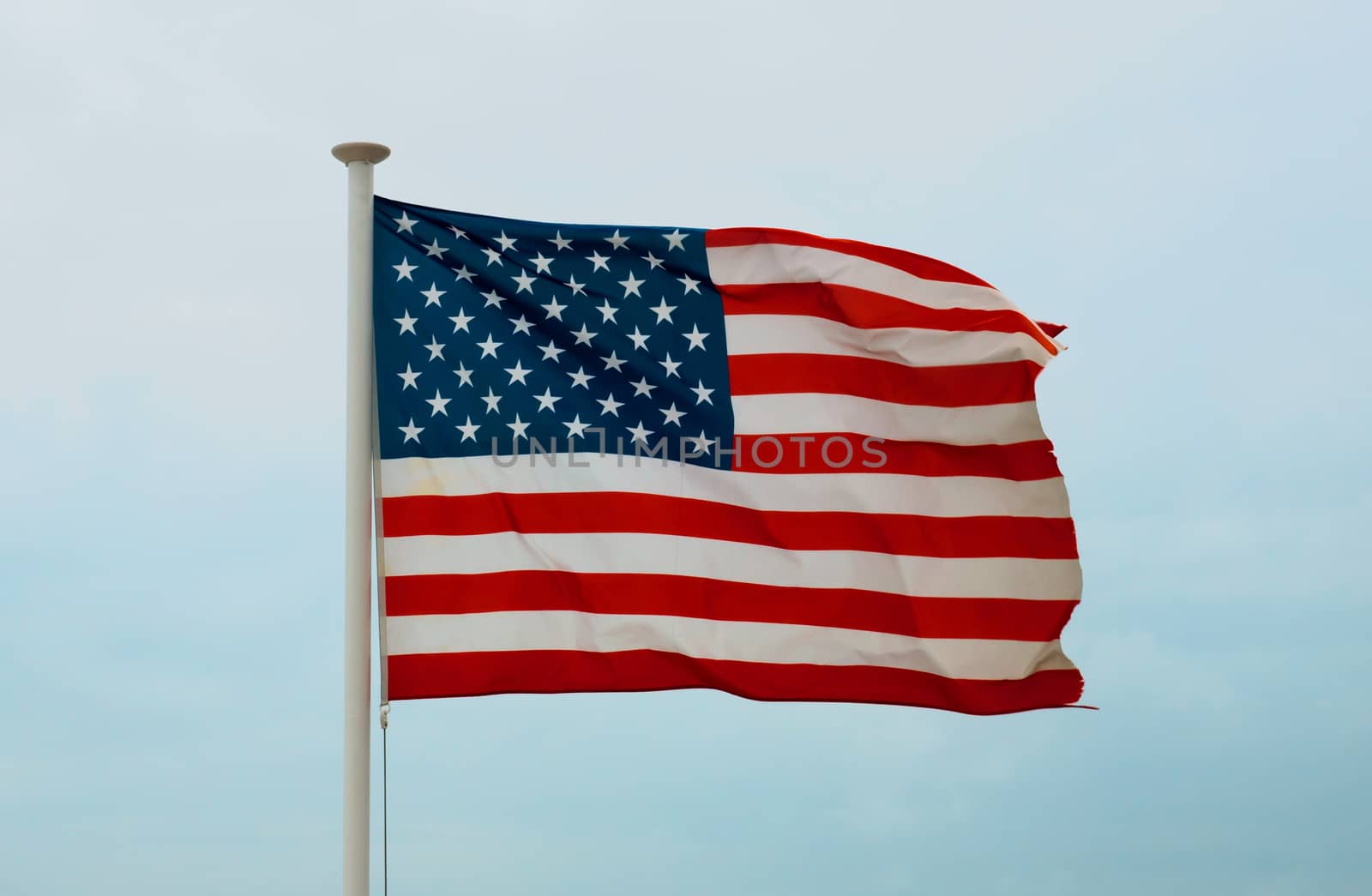United States Flag against a sky background 