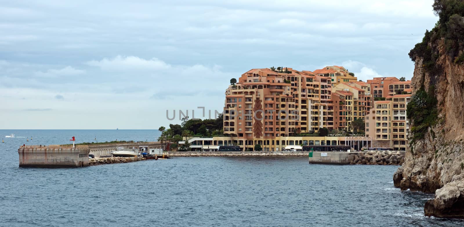 MONTE CARLO, MONACO - APRIL 28: Architecture Fontvieille district on April 28, 2013 in Monaco. Lands for the district have been reclaimed from the sea.

Monte Carlo, Monaco - April 28, 2013: Architecture Fontvieille district.  Lands for the district have been reclaimed from the sea.