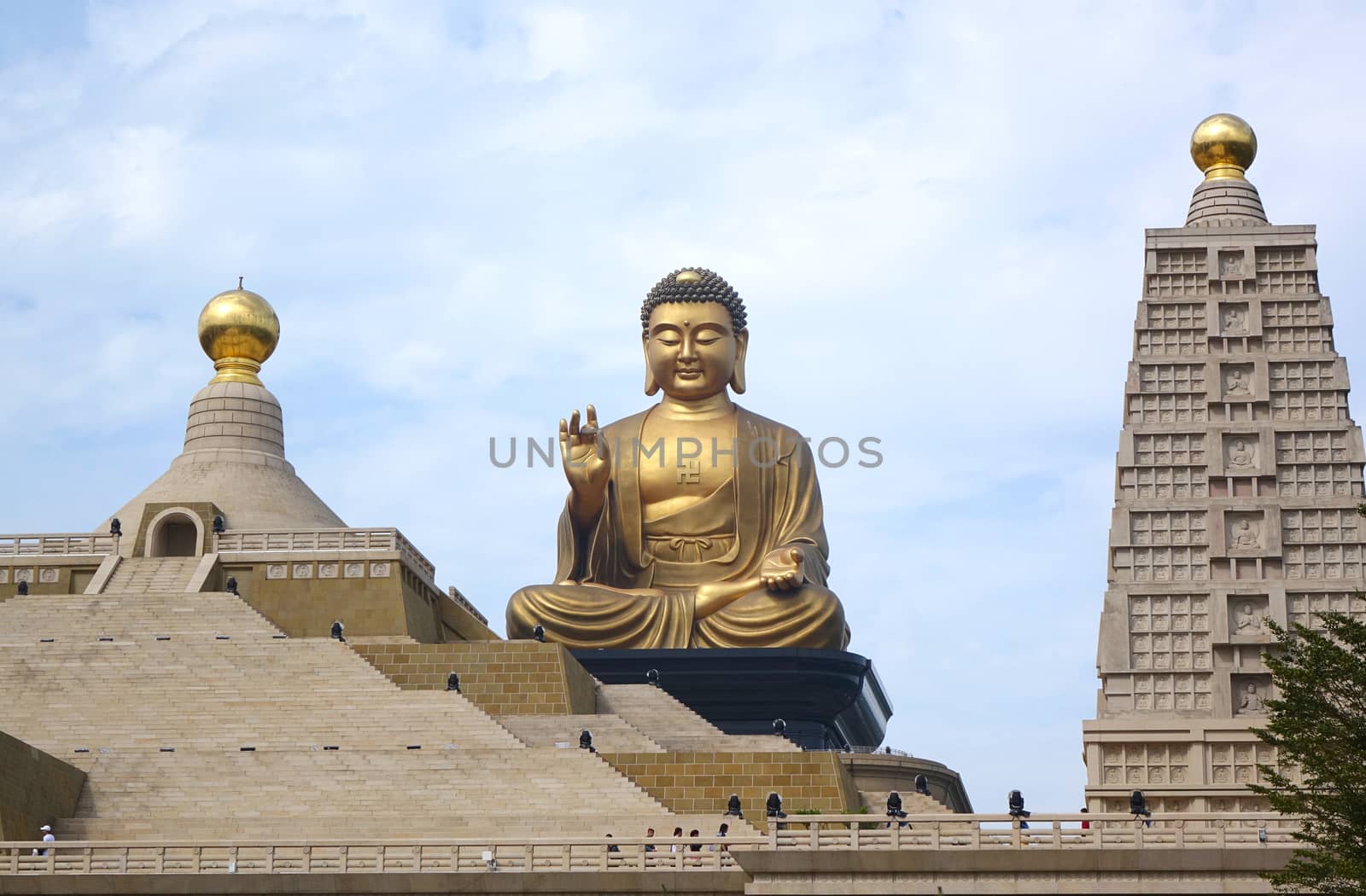 KAOHSIUNG, TAIWAN -- JANUARY 25, 2020: A giant Buddha statue overlooks the Fo Guang Shan Buddhist complex.
