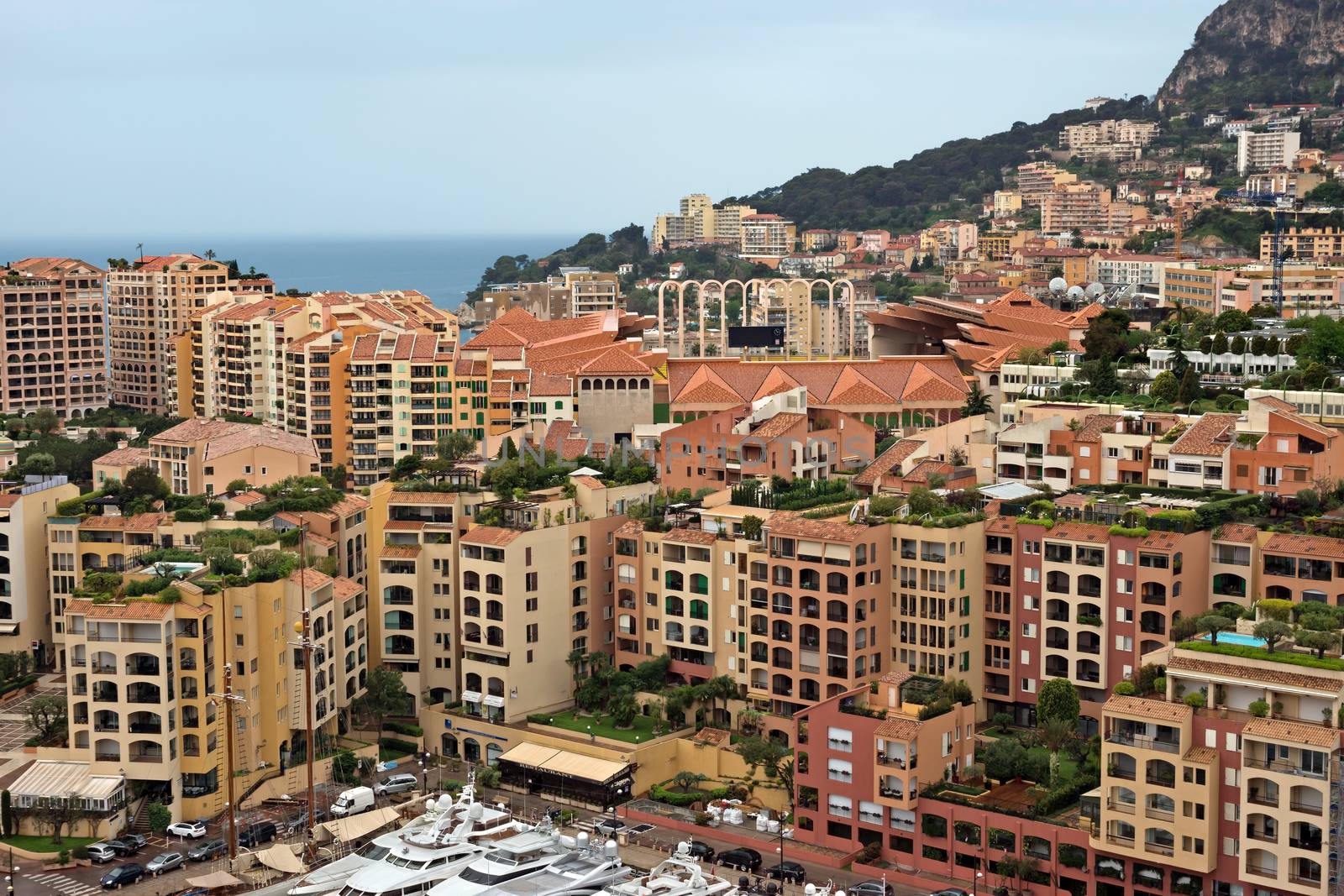 MONTE CARLO, MONACO - APRIL 28, 2013: Architecture Fontvieille district.  Lands for the district have been reclaimed from the sea.

Monte Carlo, Monaco - April 28, 2013: Architecture Fontvieille district.  Lands for the district have been reclaimed from the sea.