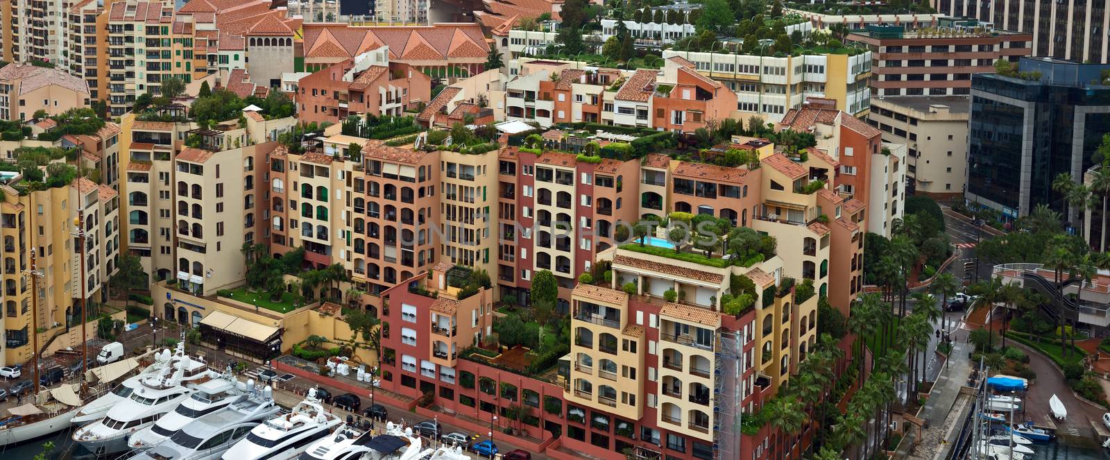 MONTE CARLO, MONACO - APRIL 28: Architecture Fontvieille district on April 28, 2013 in Monte Carlo, Monaco. Lands for the district have been reclaimed from the sea.

Monte Carlo, Monaco - April 28, 2013: Architecture Fontvieille district.  Lands for the district have been reclaimed from the sea.