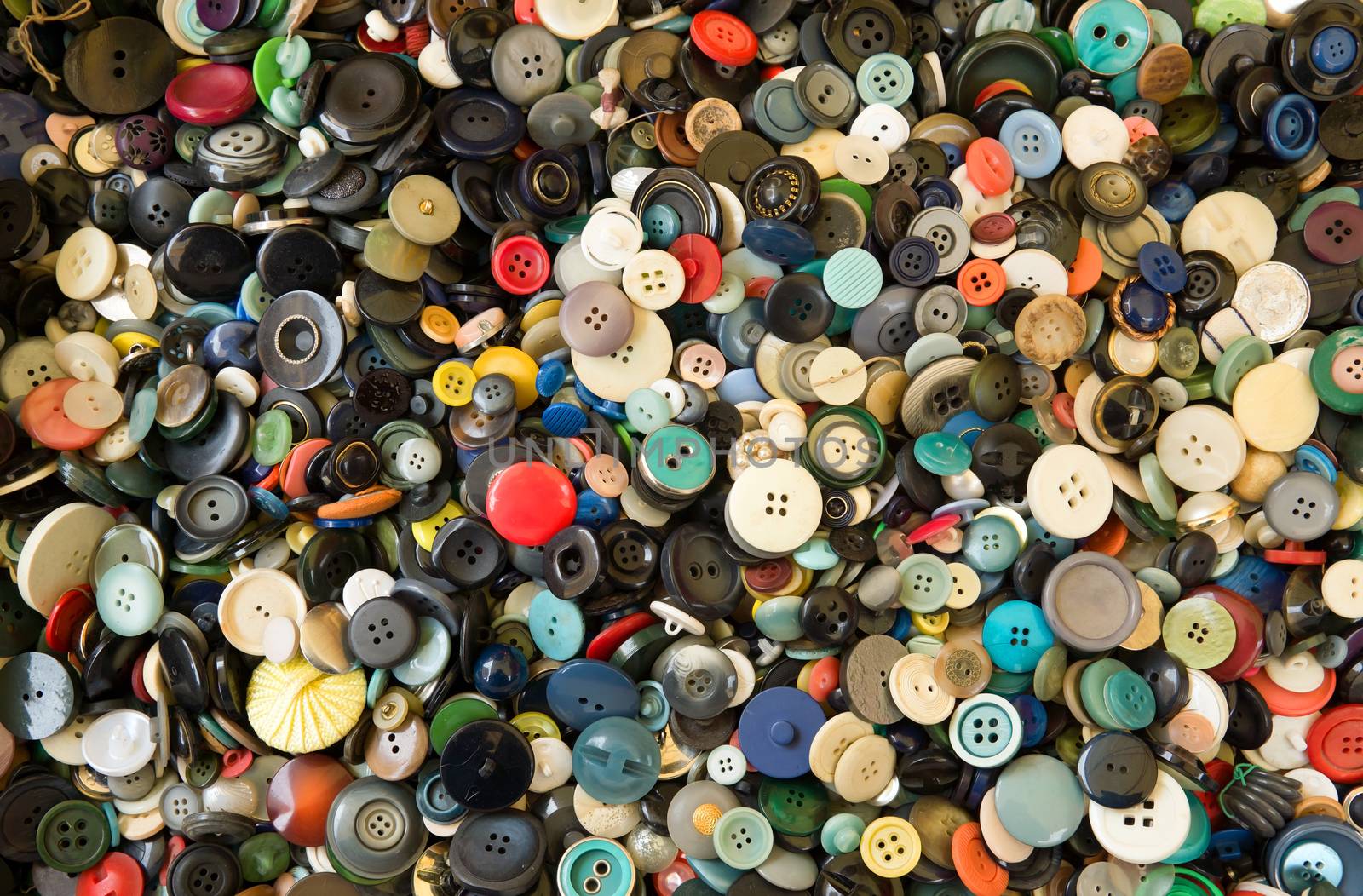 Group of vintage sewing plastic buttons background