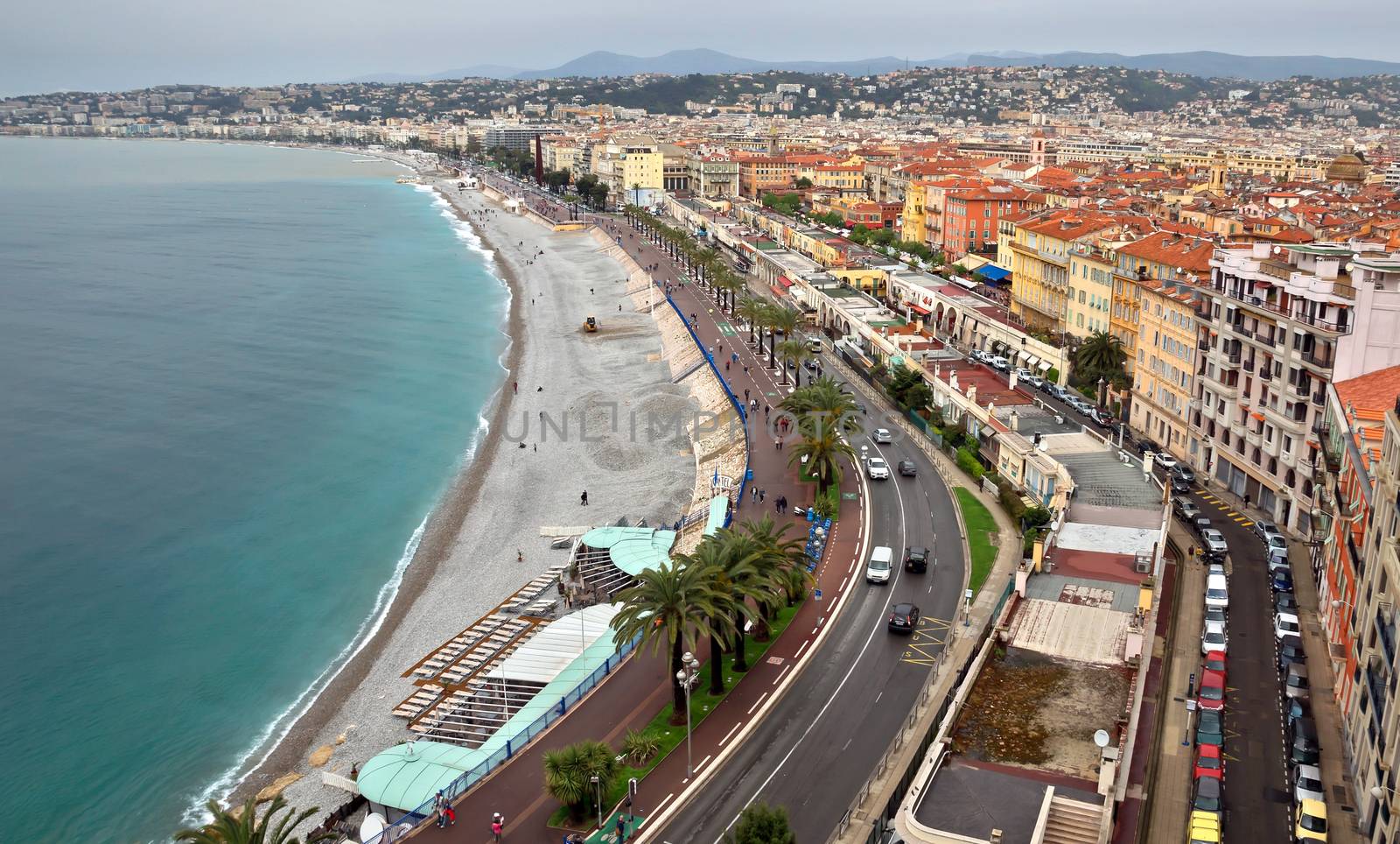 NICE, FRANCE - APRIL 29: Architecture along Promenade des Anglais on April 29, 2013 in Nice, France. It is a symbol of the Cote d'Azur and was built in 1830 at the expense of the British colony.

Nice, France - April 29, 2013: Architecture along Promenade des Anglais. Promenade des Anglais is a symbol of the Cote d'Azur and was built in 1830 at the expense of the British colony.