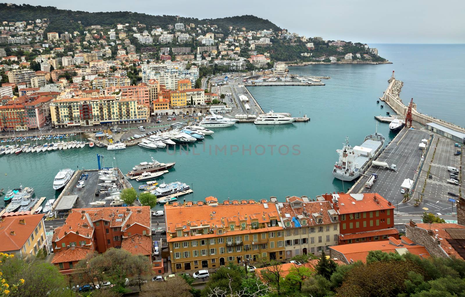 NICE, FRANCE - APRIL 29: View of Port de Nice on April 29, 2013 in Nice, France. Port de Nice was started in 1745.

Nice, France - April 29, 2013: View of Port de Nice in French Riviera. Port de Nice was started in 1745.