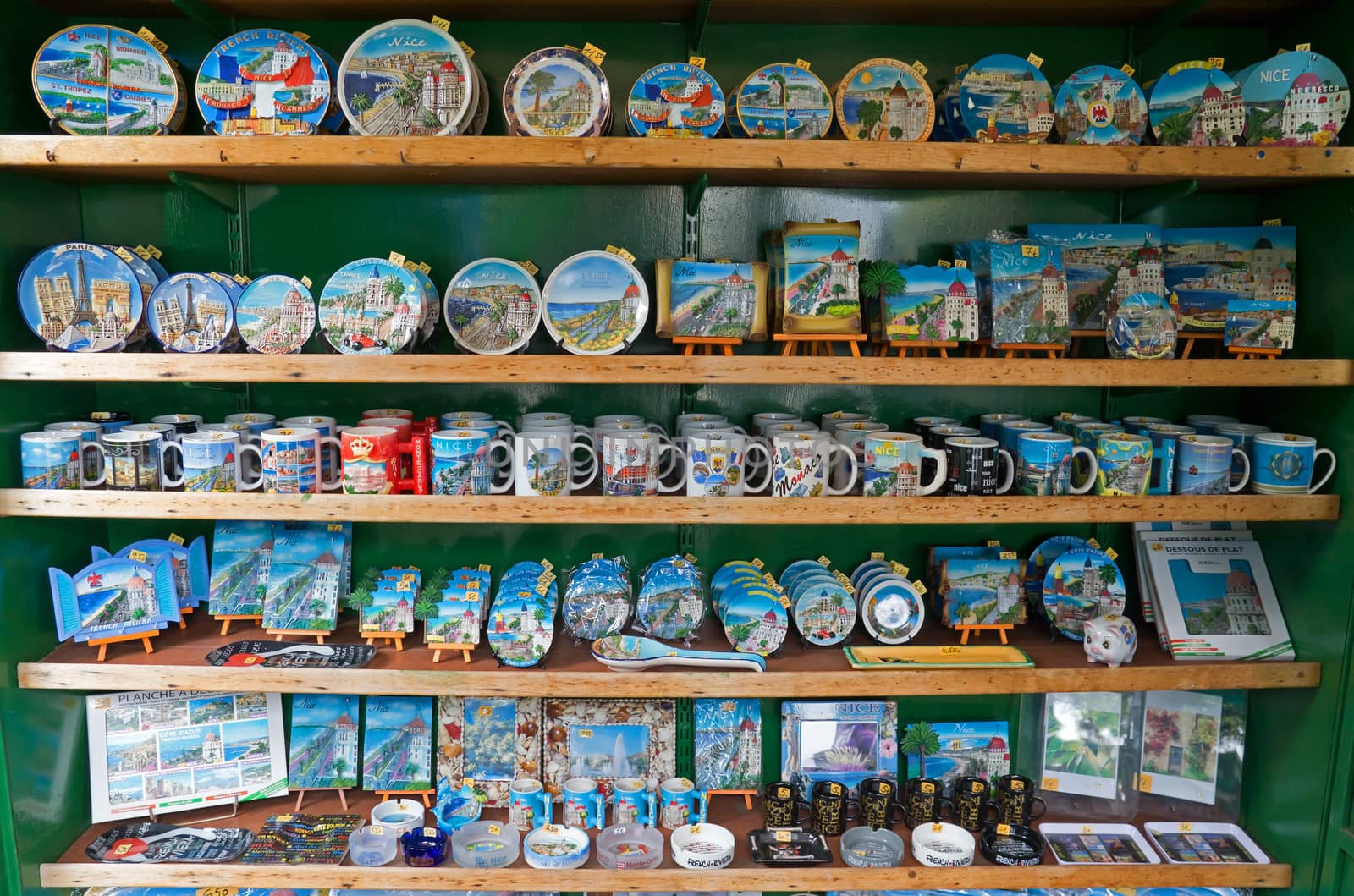 NICE, FRANCE - APRIL 29: Souvenirs made of ceramics with views of cities - Nice, Monte Carlo, Cannes in a souvenir shop on April 29, 2013 in Nice, France.

Nice, France - April 29, 2013: Souvenirs made of ceramics with views of cities - Nice, Monte Carlo, Cannes in a souvenir shop