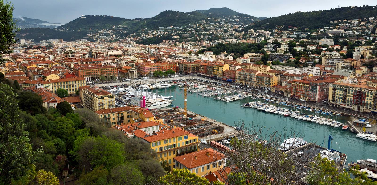 NICE, FRANCE - APRIL 29: Panoramic view of Port de Nice on April 29, 2013 in Nice, France. Port de Nice was started in 1745.

Nice, France - April 29, 2013: Panoramic view of Port de Nice in French Riviera. Port de Nice was started in 1745.