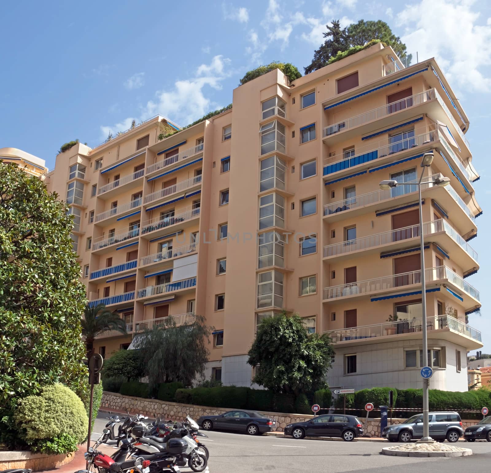 MONTE CARLO, MONACO - MAY 1: The architecture of buildings near Grand Casino on May 1, 2013 in Monte Carlo, Monaco. 

Monte Carlo, Monaco - May 1, 2013: The architecture of buildings near Grand Casino.