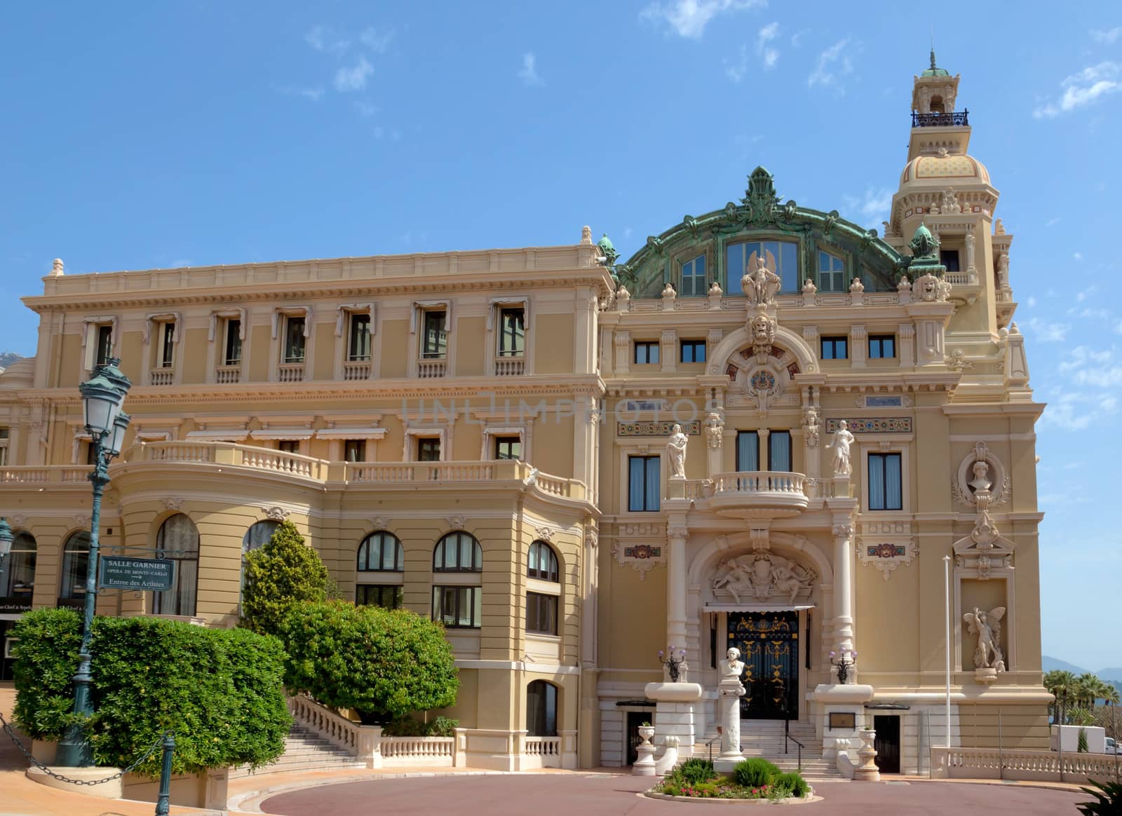MONTE CARLO, MONACO - MAY 1: Building of the Grand Casino on May 1, 2013 in Monte Carlo, Monaco. The Casino is one of the most notable buildings in Principality. 

Monte Carlo, Monaco - May 1, 2013: Building of the Grand Casino. The Casino is one of the most notable buildings in Principality.