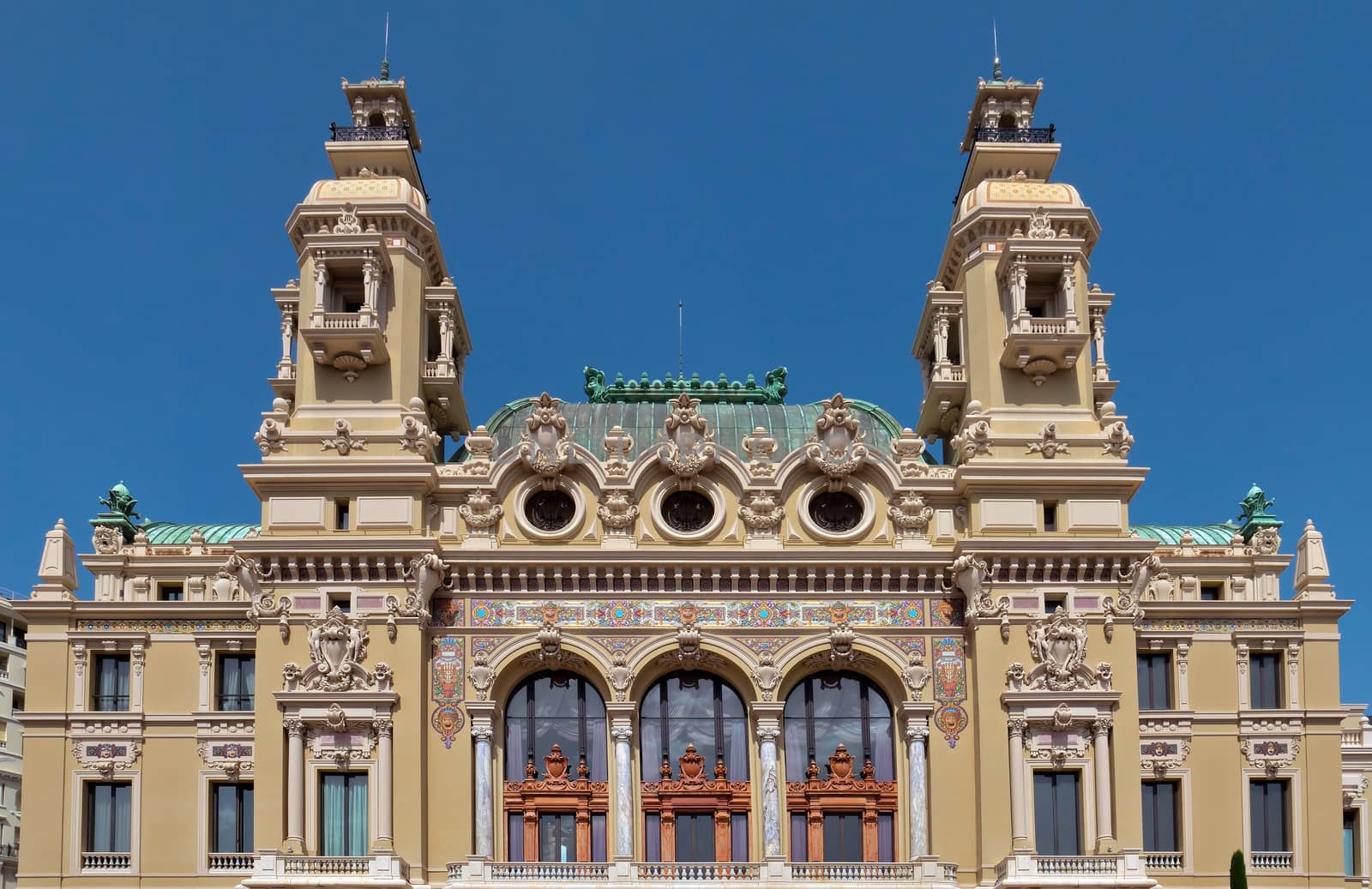 MONTE CARLO, MONACO - MAY 1: Front of the Grand Casino on May 1, 2013 in Monte Carlo, Monaco. The Casino is one of the most notable buildings in Principality. 

Monte Carlo, Monaco - May 1, 2013: Front of the Grand Casino. The Casino is one of the most notable buildings in Principality.