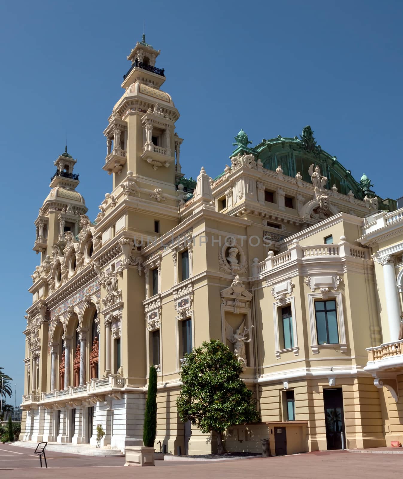 MONTE CARLO, MONACO - MAY 1: Front of the Grand Casino on May 1, 2013 in Monte Carlo, Monaco. The Casino is one of the most notable buildings in Principality. 

Monte Carlo, Monaco - May 1, 2013: Front of the Grand Casino. The Casino is one of the most notable buildings in Principality.