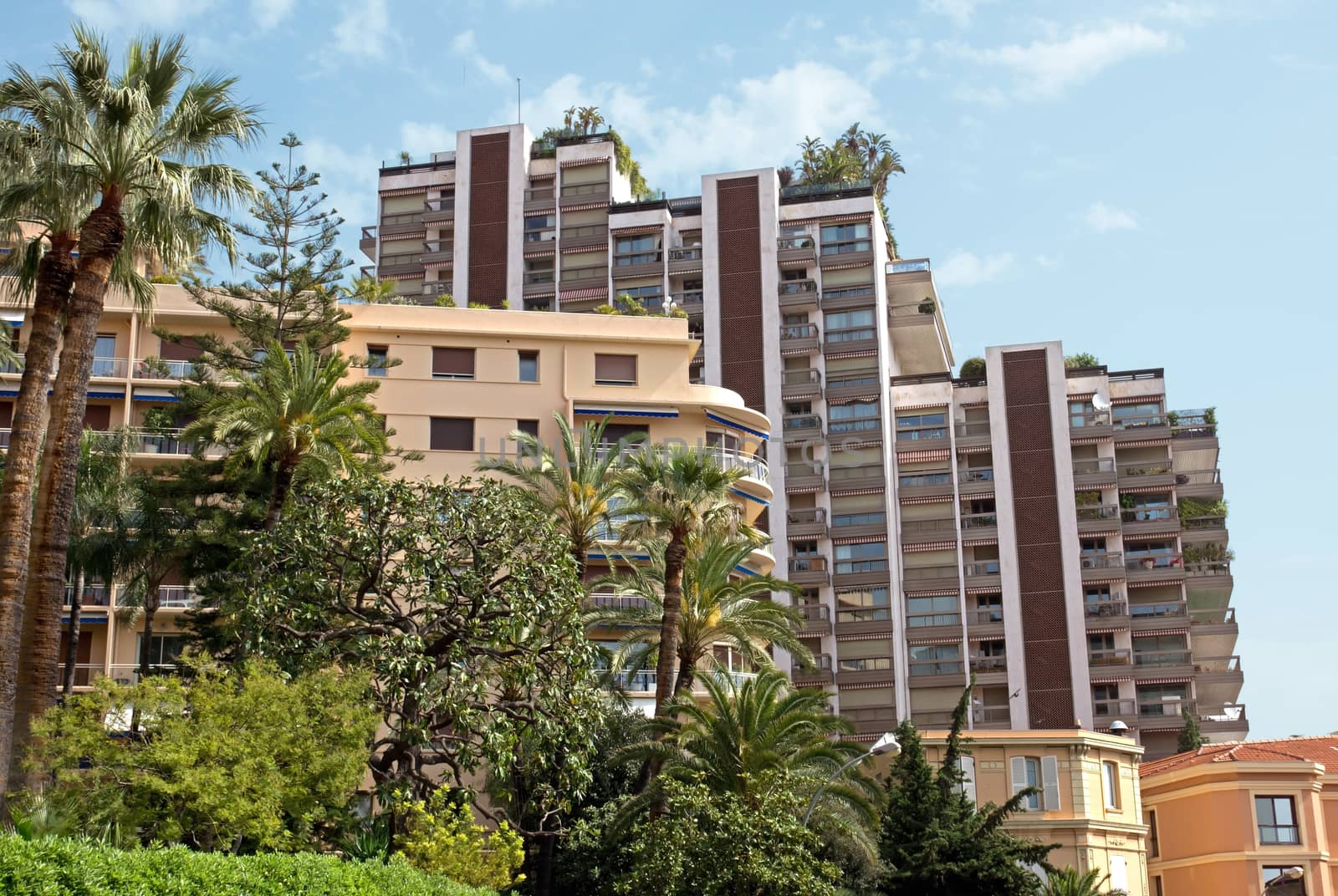MONTE CARLO, MONACO - MAY 1: The architecture of buildings near Grand Casino on May 1, 2013 in Monte Carlo, Monaco. 

Monte Carlo, Monaco - May 1, 2013: The architecture of buildings near Grand Casino.
