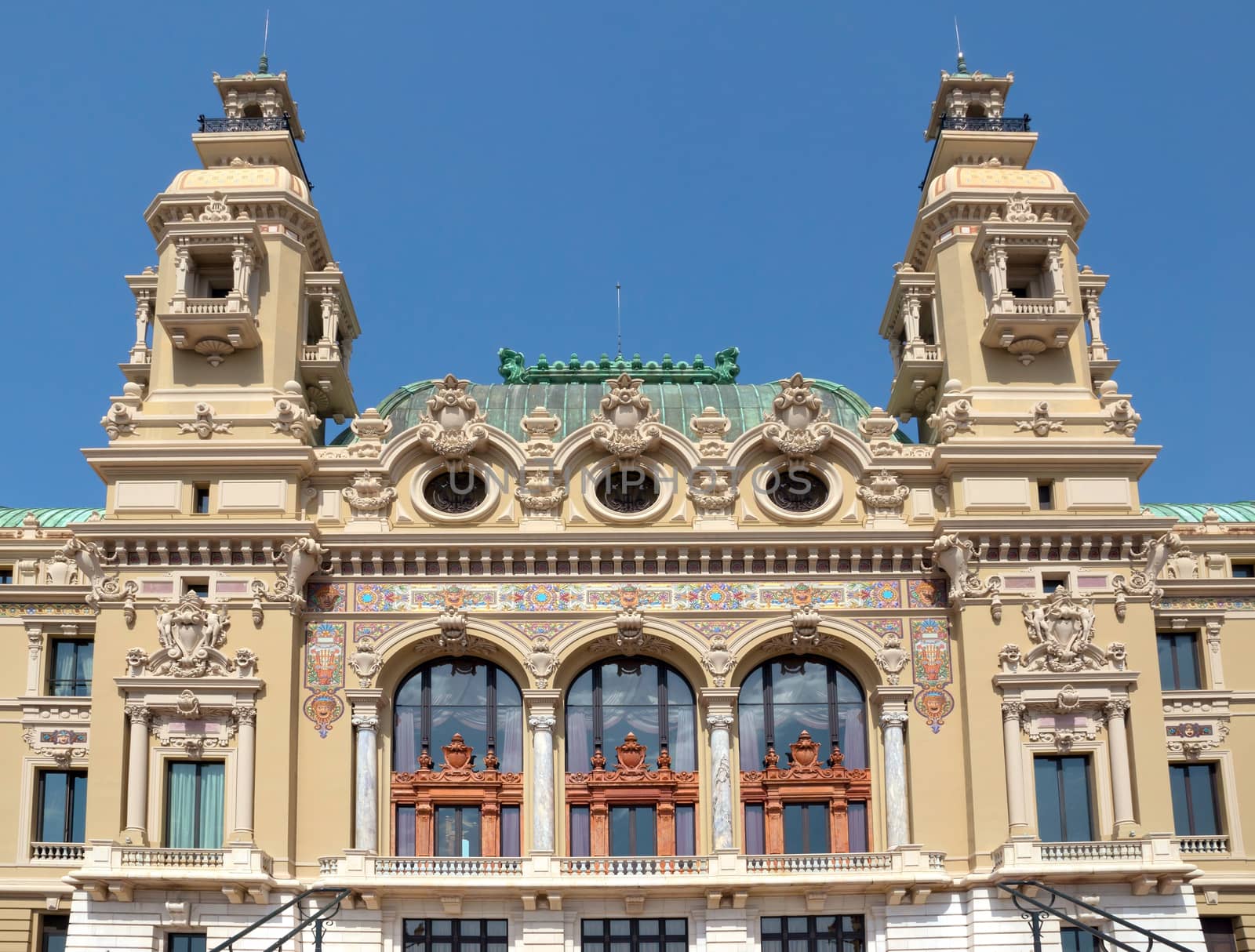 MONTE CARLO, MONACO - MAY 1: Front of the Grand Casino on May 1, 2013 in Monte Carlo, Monaco. The Casino is one of the most notable buildings in Principality. 

Monte Carlo, Monaco - May 1, 2013: Front of the Grand Casino. The Casino is one of the most notable buildings in Principality.