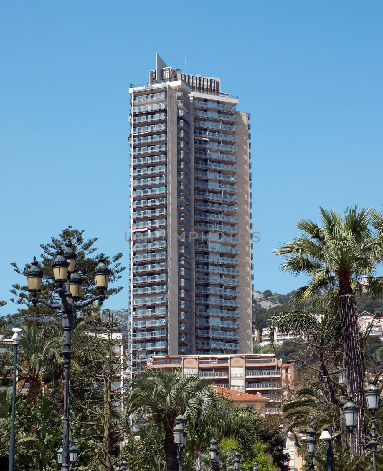 MONTE CARLO, MONACO - MAY 1: The architecture of buildings near Grand Casino on May 1, 2013 in Monte Carlo, Monaco. 

Monte Carlo, Monaco - May 1, 2013: The architecture of buildings near Grand Casino.