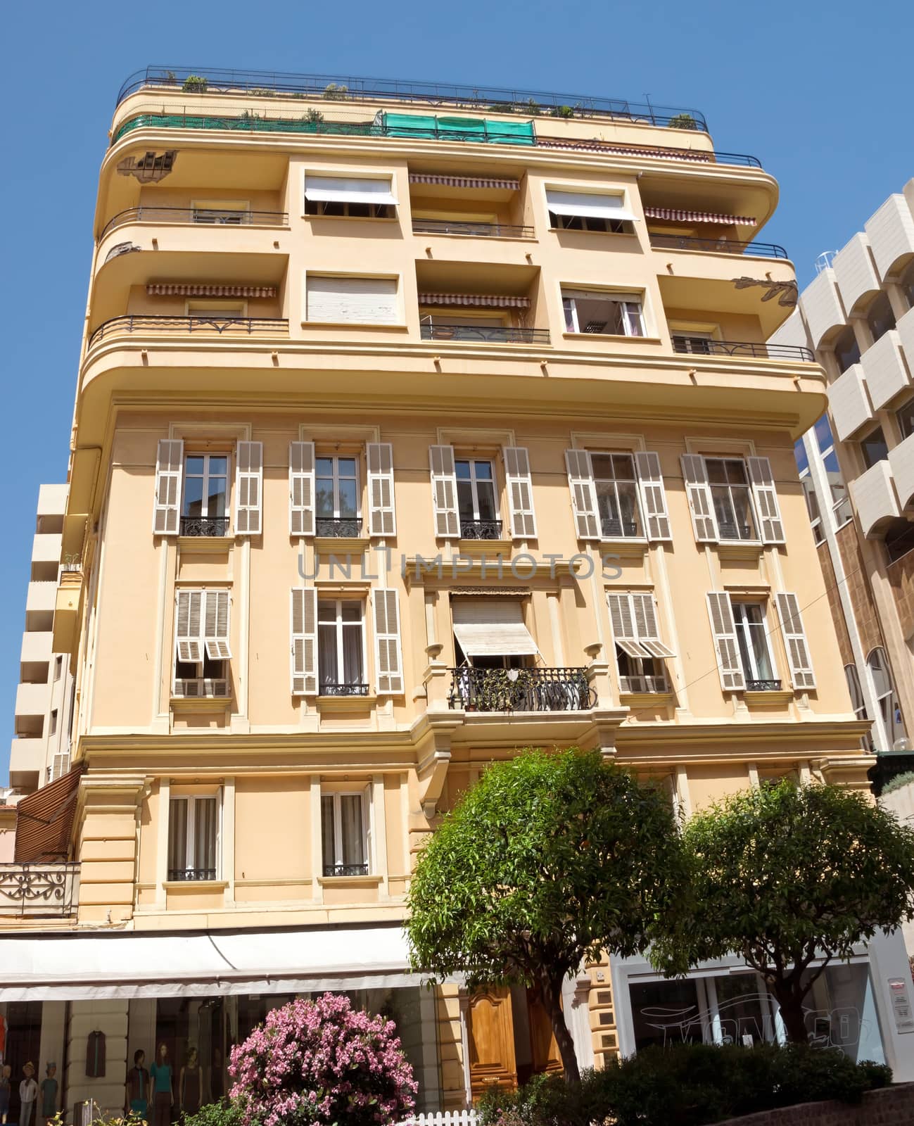 MONTE CARLO, MONACO - MAY 1: The architecture of buildings near Grand Casino on May 1, 2013 in Monte Carlo, Monaco. Monaco is a luxury resort on the Mediterranean coast.

Monte Carlo, Monaco - May 1, 2013: The architecture of buildings near Grand Casino. Monaco is a luxury resort on the Mediterranean coast.