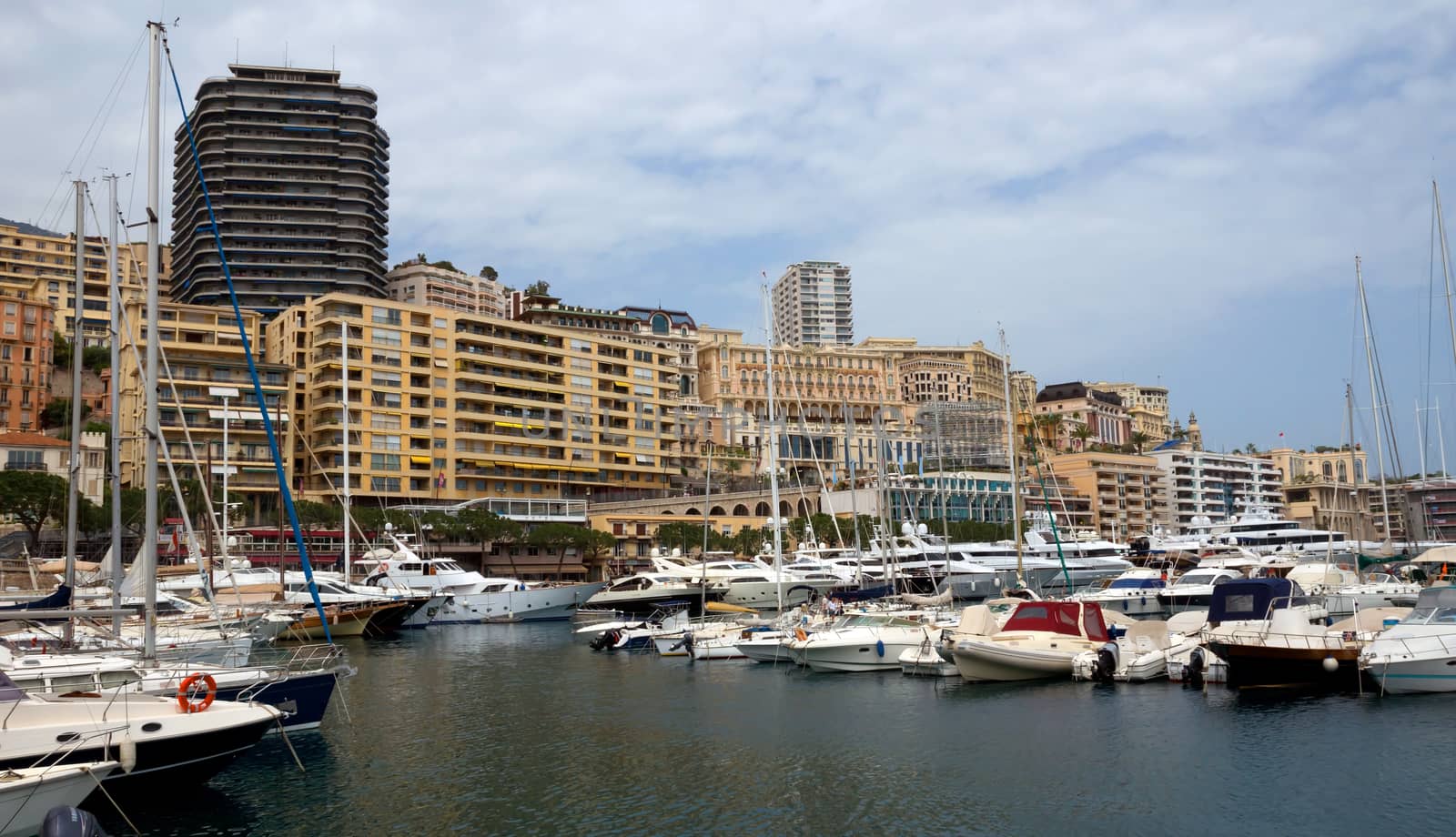 MONTE CARLO, MONACO - MAY 1: Cityscape and harbor Hercules on May 1, 2013 in Monte Carlo, Monaco. 

Monte Carlo, Monaco - May 1, 2013: Cityscape and harbor Hercules.