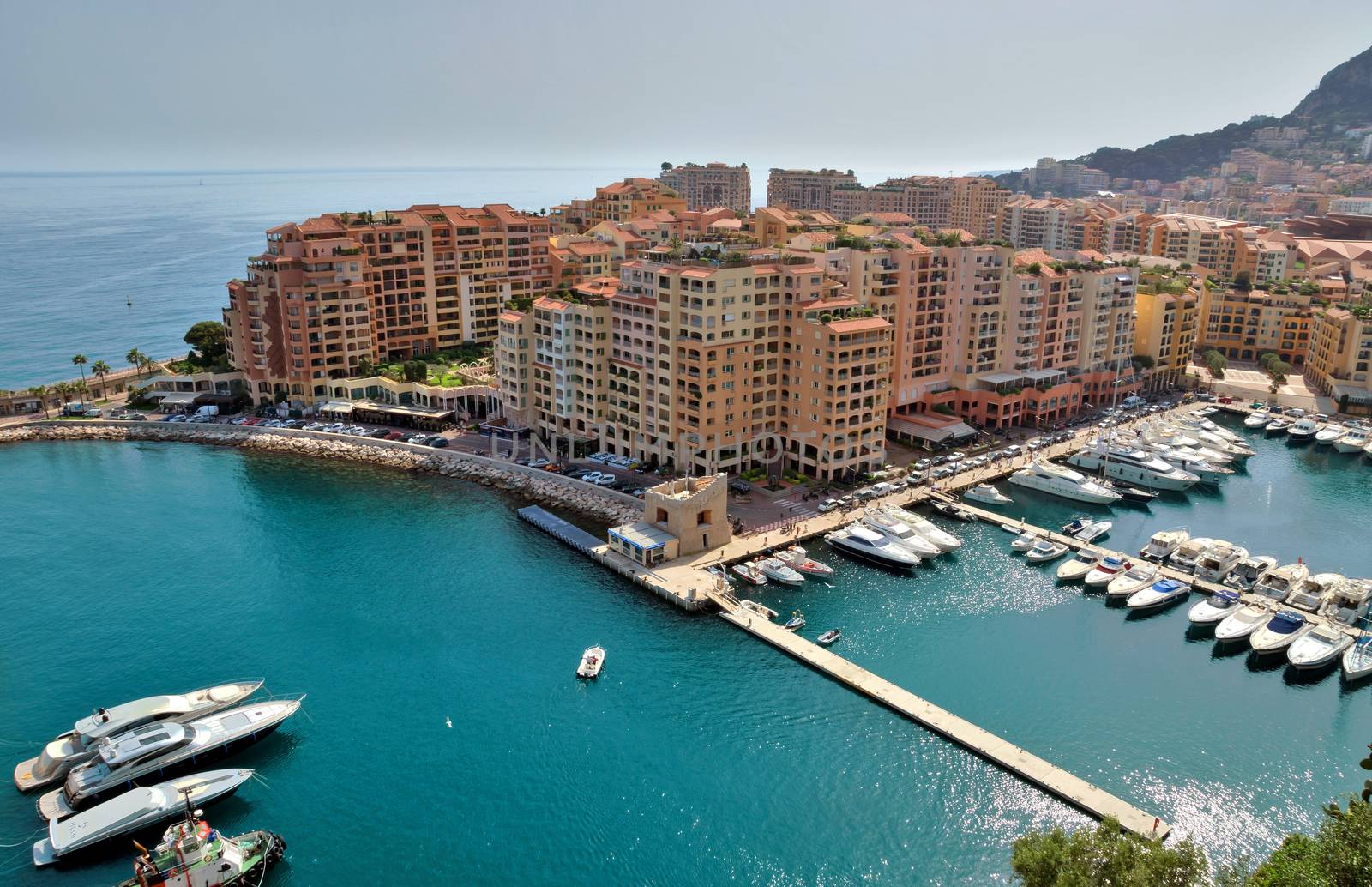 MONTE CARLO, MONACO - MAY 1: Architecture of Fontville district on May 1, 2013 in Monte Carlo, Monaco. Lands for the district have been reclaimed from the sea.

Monte Carlo, Monaco - May 1, 2013: Architecture of Fontville district.  Lands for the district have been reclaimed from the sea.