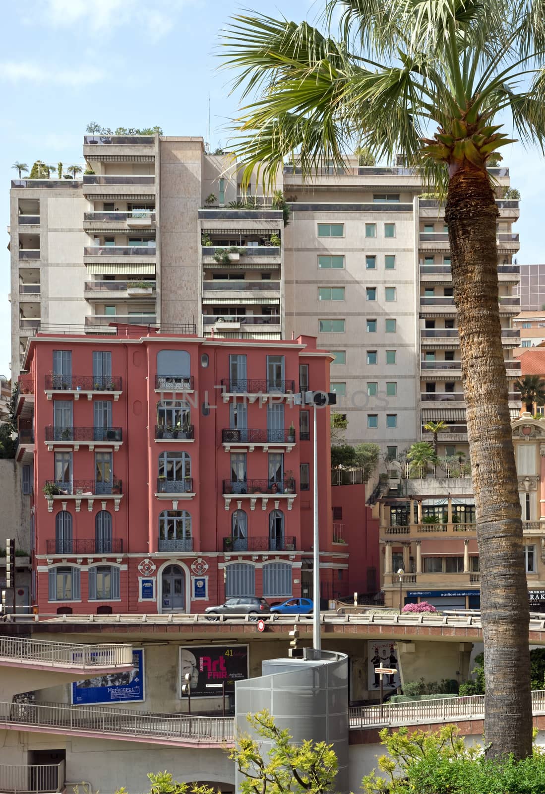 MONTE CARLO, MONACO - MAY 1: The architecture of buildings near Grand Casino on May 1, 2013 in Monte Carlo, Monaco. 

Monte Carlo, Monaco - May 1, 2013: The architecture of buildings near Grand Casino.