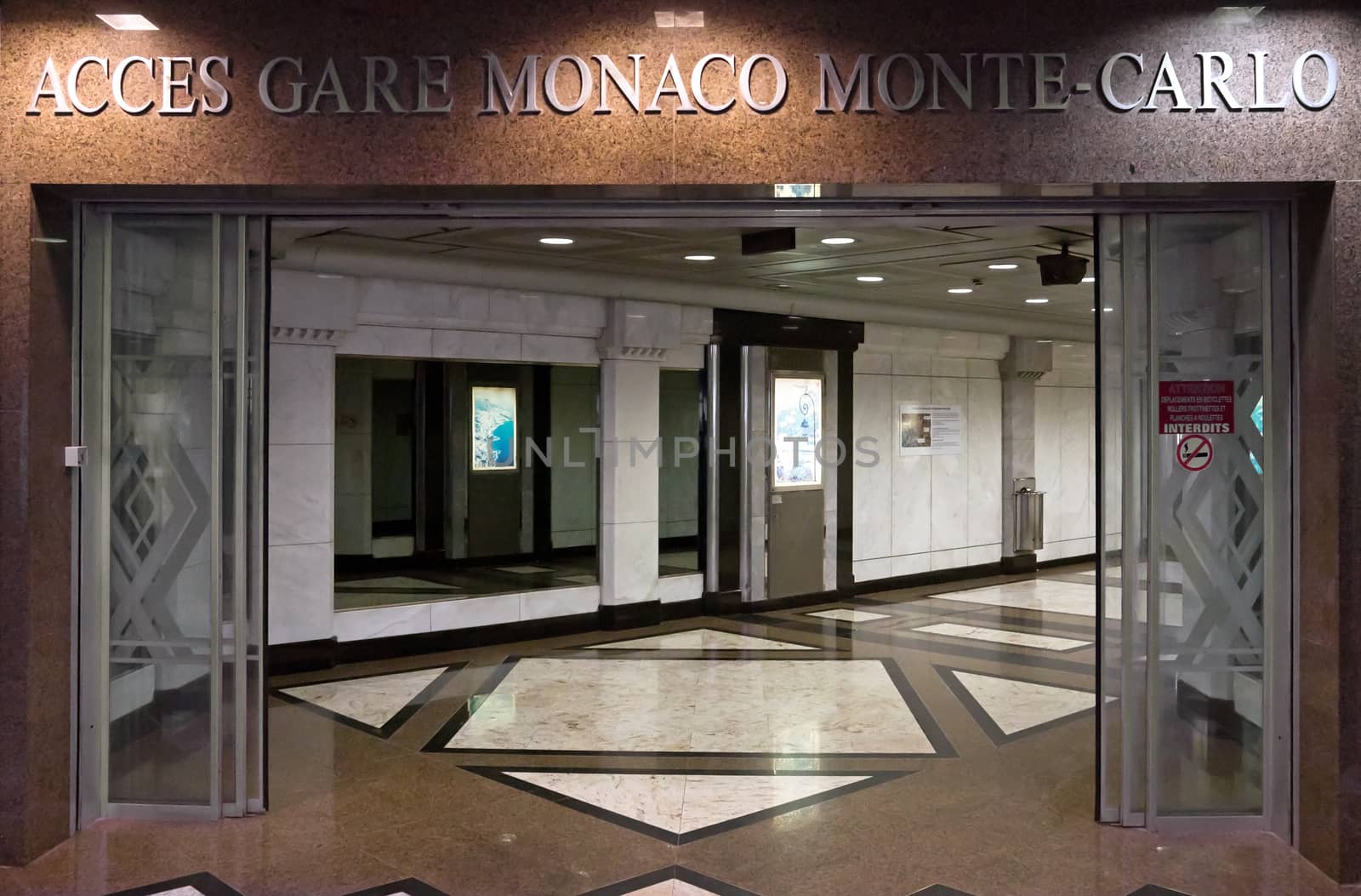 MONTE CARLO, MONACO - MAY 1: One of more entrances to the pedestrian tunnel on May 1, 2013 in Monte Carlo, Monaco. It's connect the different parts of the country and are very convenient for moving.

Monte Carlo, Monaco - May 1, 2013: One of more entrances to the pedestrian tunnel. It's connect the different parts of the country and are very convenient for moving.