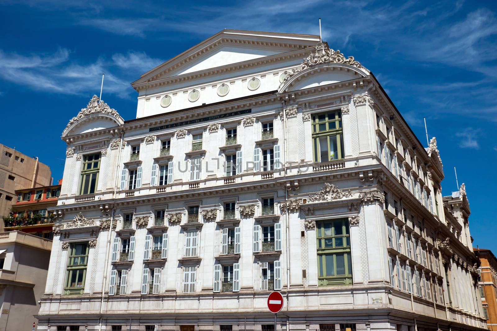 NICE, FRANCE - MAY 4: Opera de Nice located at the Promenade des Anglais on May 4, 2013 in Nice, France. It was built in 1776 by Marquess Alli-Maccarani.

Nice, France - May 4, 2013: Front facade of the Opera house. Opera de Nice located at the Promenade des Anglais. It was built in 1776 by Marquess Alli-Maccarani. Sold in 1787, it reopened in 1790 under the name “Theatre Royal”.
