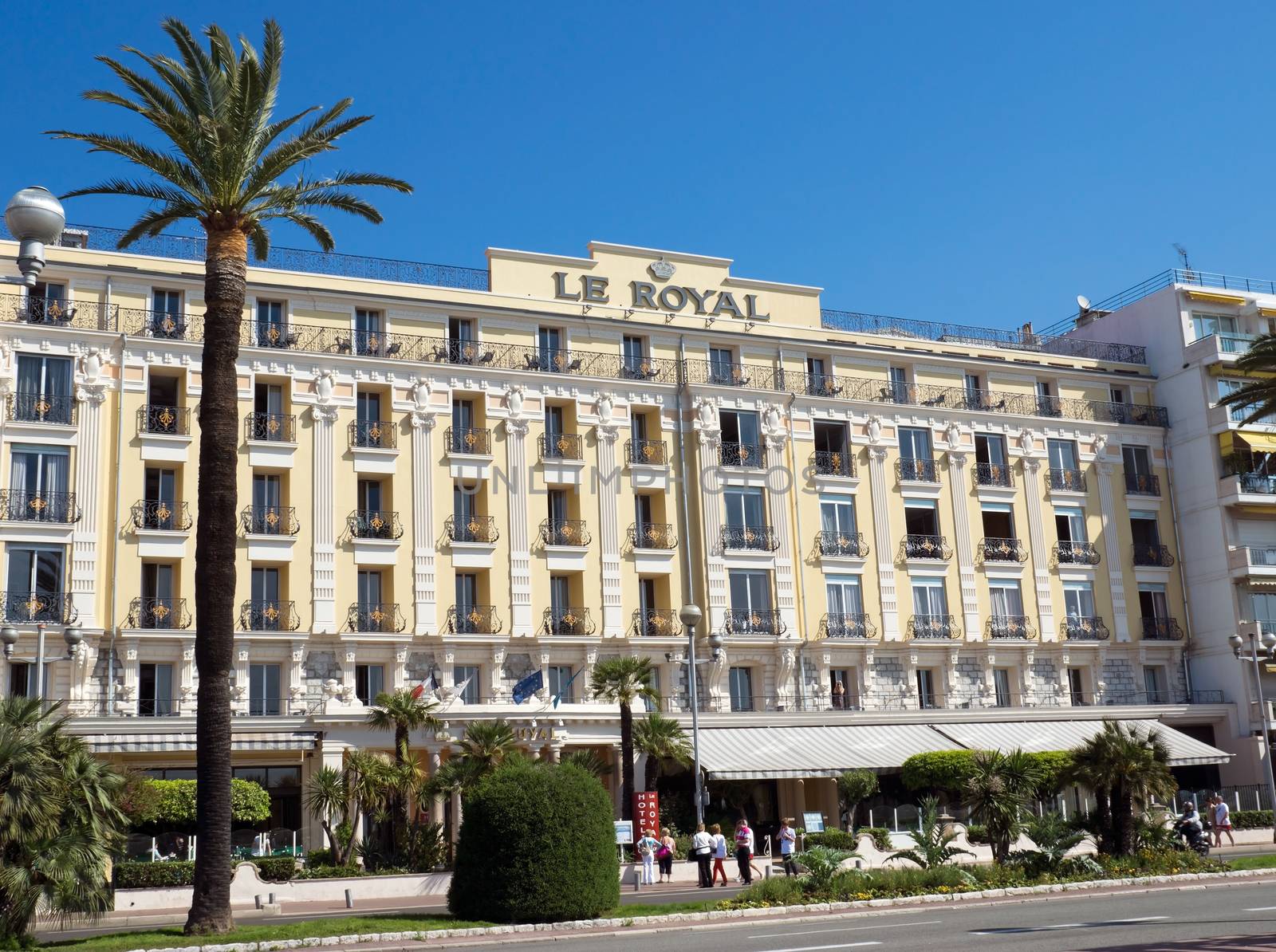 NICE, FRANCE - MAY 4: Hotel Le Royal on Promenade des Anglais on May 4, 2013 in Nice, France. It is built in 1910, Le Royal hotel is centrally located in Nice.

Nice, France - May 4, 2013: Hotel Le Royal on Promenade des Anglais. It is built in 1910, Le Royal hotel is centrally located in Nice.