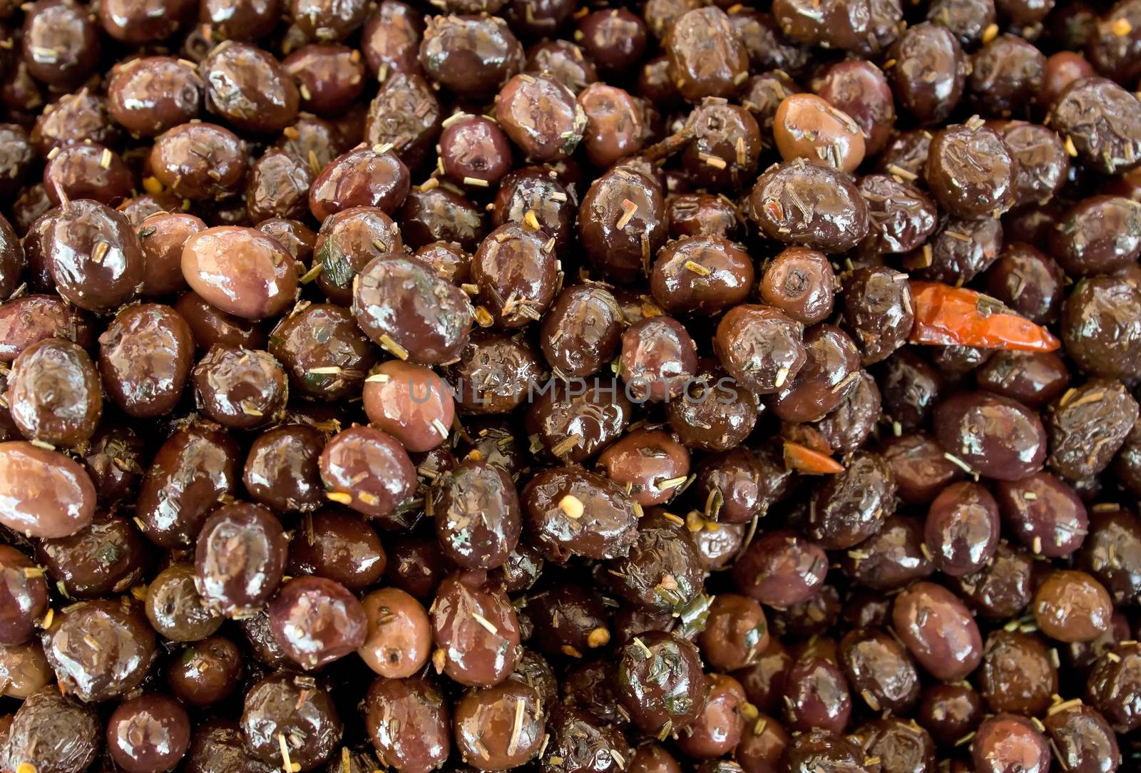 Brown olives backgrounds at the street market