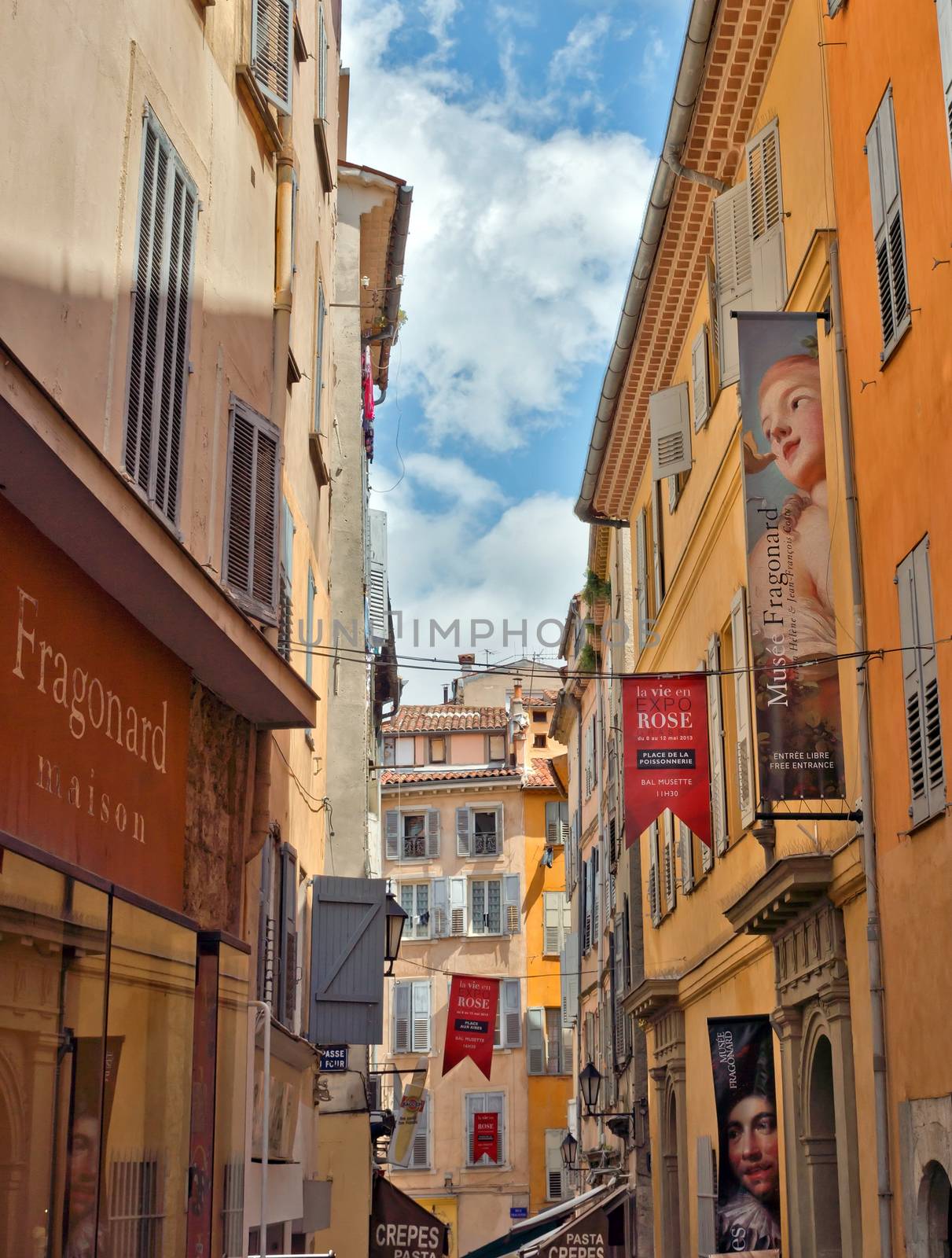 GRASSE, FRANCE - MAY 3: Architecture of Grasse Town in the southern France on May 3, 2013 in Grasse, France. Grasse is famous for its perfume industry. The city was founded in the XI century.

Grasse, France - May 3, 2013: Architecture of Grasse Town in the southern France. It is a city in the French department of Alpes-Maritimes. Grasse is famous for its perfume industry. The city was founded in the XI century.