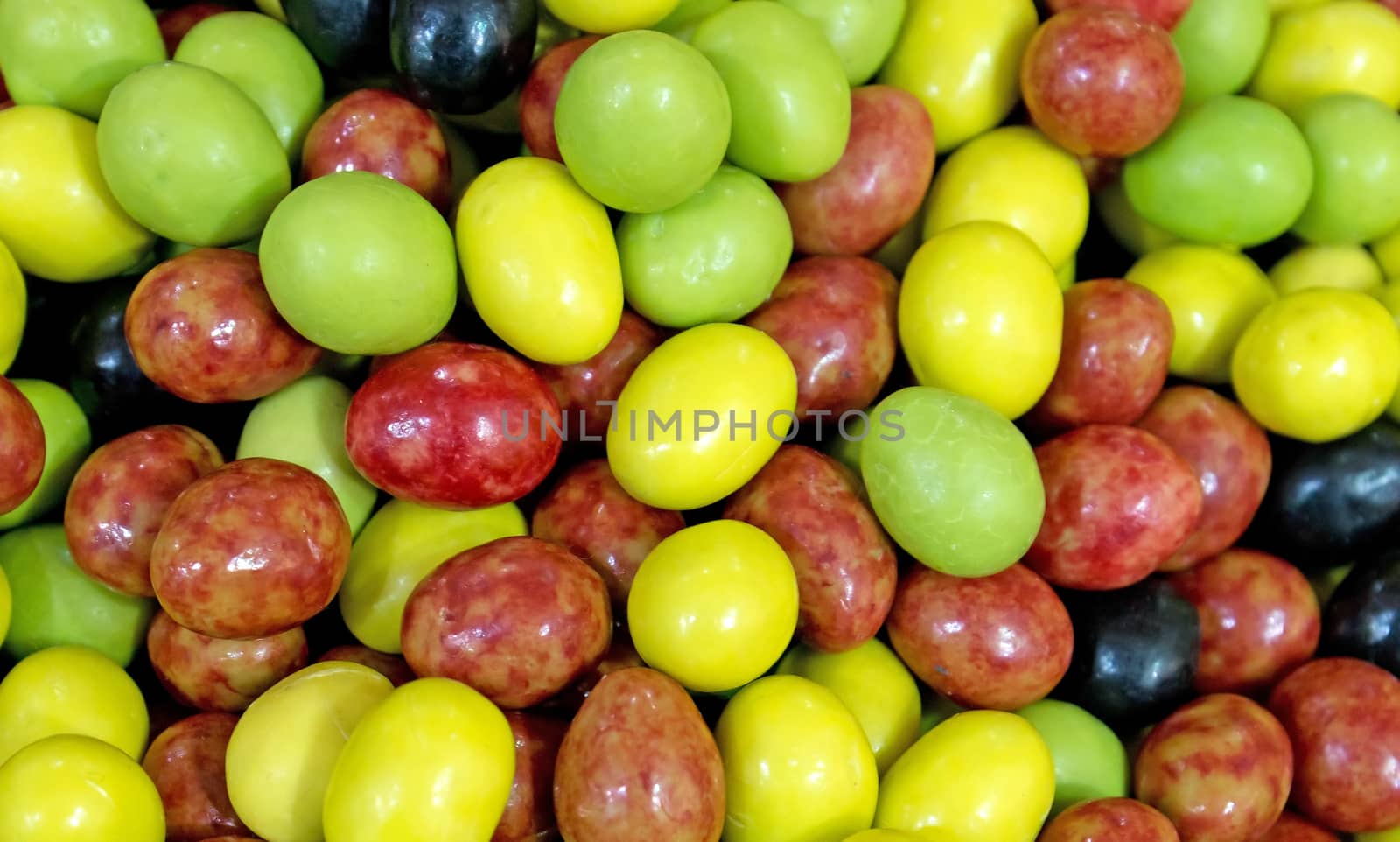 Background of colorful dragee, sugar covered nuts