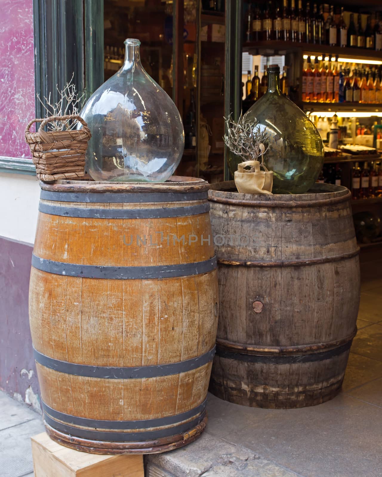 Two wooden barrels for wine with steel ring.