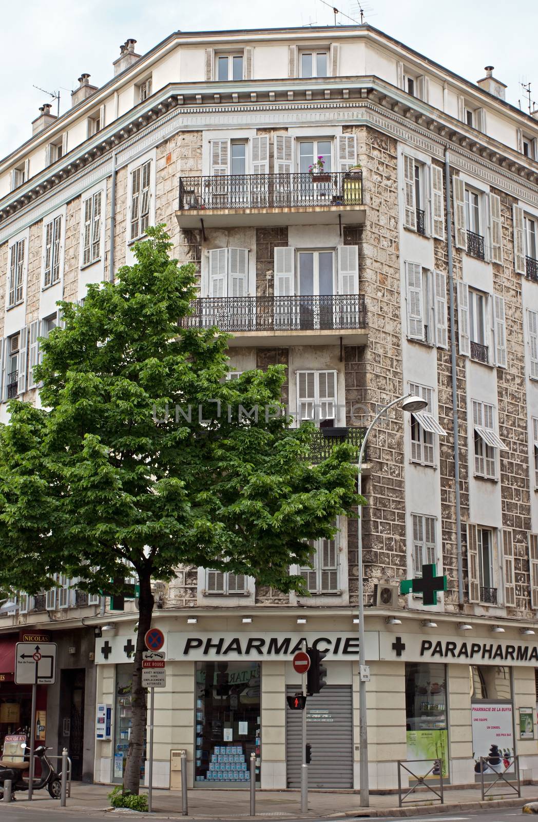 NICE, FRANCE - MAY 5: Architecture along Promenade des Anglais on May, 5, 2013 in Nice, France. It is a symbol of the Cote d'Azur and was built in 1830 at the expense of the British colony.

Nice, France - May 5, 2013: Architecture along Promenade des Anglais. Promenade des Anglais is a symbol of the Cote d'Azur and was built in 1830 at the expense of the British colony.