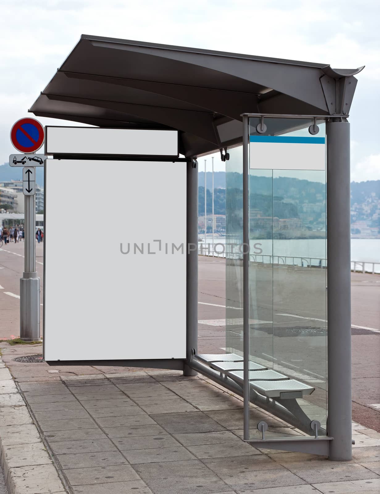 Blank Billboard on Bus Stop for your advertising situated (with work path) on Promenade Des Anglais, Nice, France.