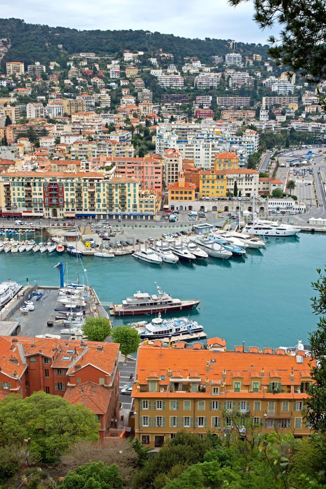 NICE, FRANCE - MAY 5: Aerial view of the Port de Nice on May 5, 2013 in Nice, France. Port de Nice was started in 1745.

Nice, France - May 5, 2013: Aerial view of the Port de Nice in French Riviera. Port de Nice was started in 1745.