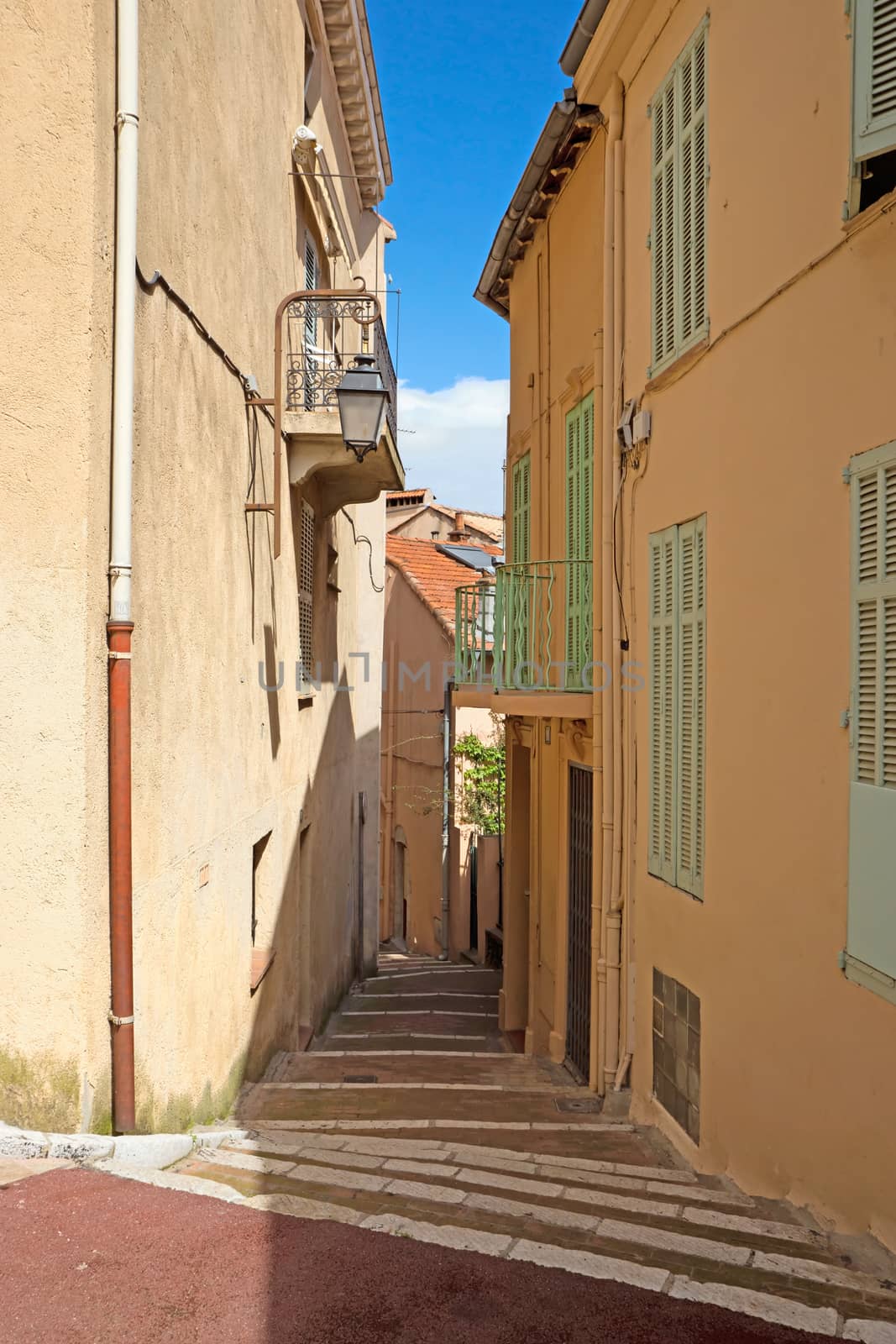 Old district in historical centre of Cannes, France. Cannes is a city located in the French Riviera. The city is also famous for its luxury shops, restaurants, and hotels. City founded by the Romans in 42 BC.