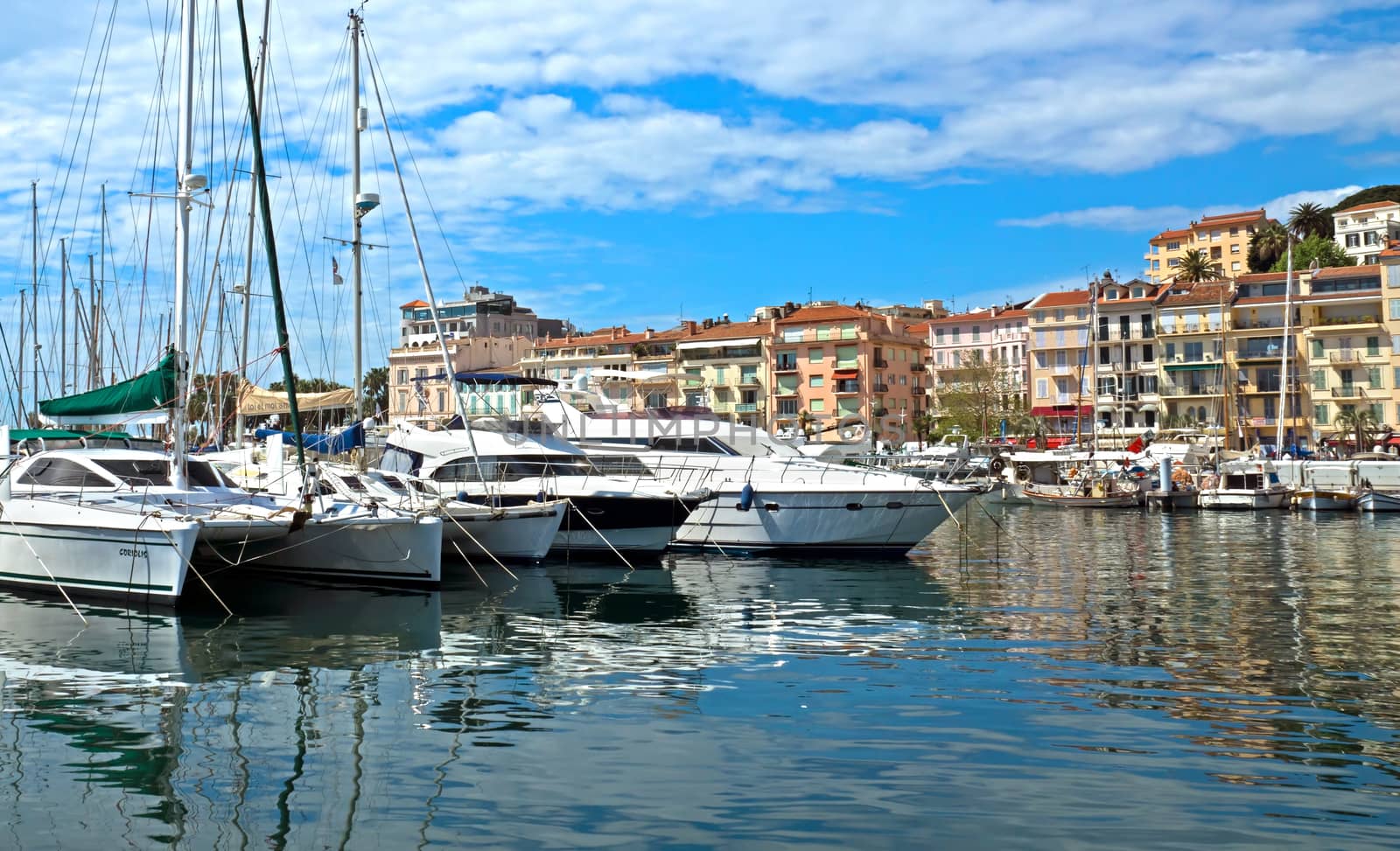 CANNES, FRANCE - MAY 6: View of Le Suquet- the old town and Port Le Vieux on May 6, 2013 in Cannes, France. City founded by the Romans in 42 BC.

Cannes, France - May 6, 2013: View of Le Suquet- the old town and Port Le Vieux of Cannes, France. Cannes is a city located in the French Riviera. The city is also famous for its luxury shops, restaurants, and hotels. City founded by the Romans in 42 BC.