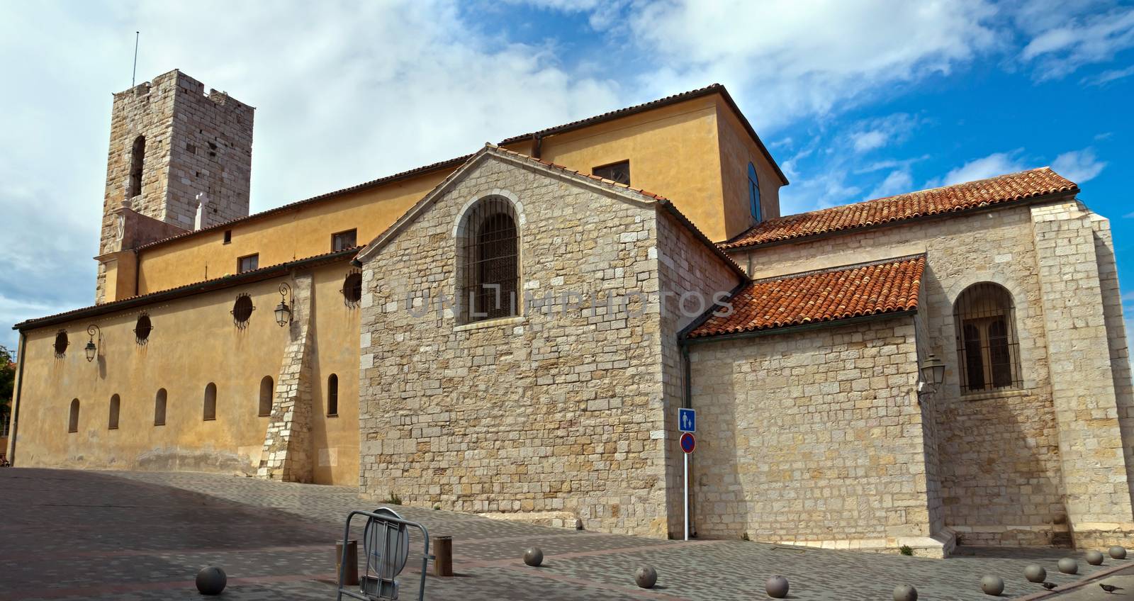 ANTIBES, FRANCE - MAY 6: Grimaldi Castle on May 6, 2013 in Antibes, France. Grimaldi Castle now is the Picasso Museum, where are exposed paintings and ceramics of Pablo Picasso. 

Antibes, France - May 6, 2013: Grimaldi Castle. Grimaldi Castle now is the Picasso Museum, where are exposed paintings and ceramics of Pablo Picasso.