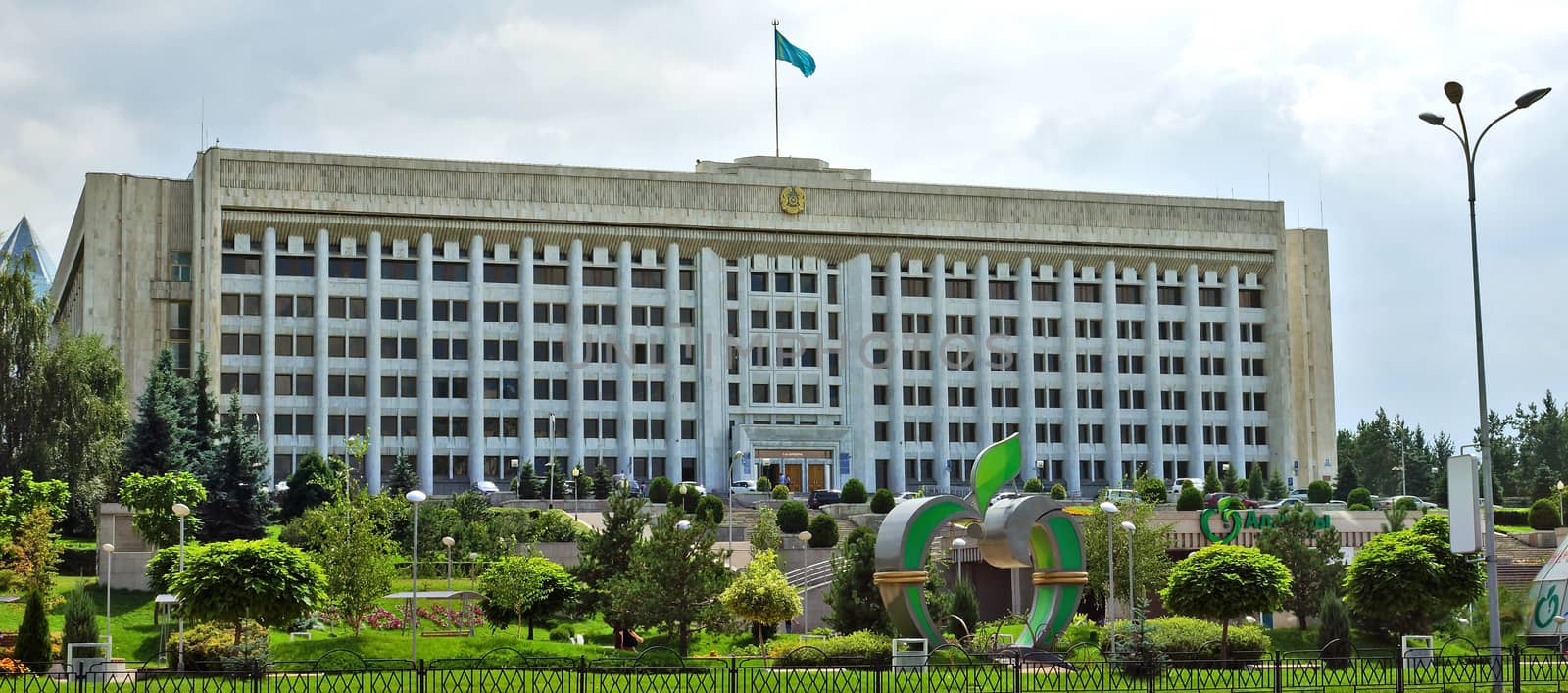 ALMATY, KAZAKHSTAN - AUGUST 11: The building of city administration at the Republic Square on August 11, 2013 in Almaty, Kazakhstan. 

Almaty, Kazakhstan - August 11, 2013: The building of city administration at the Republic Square.