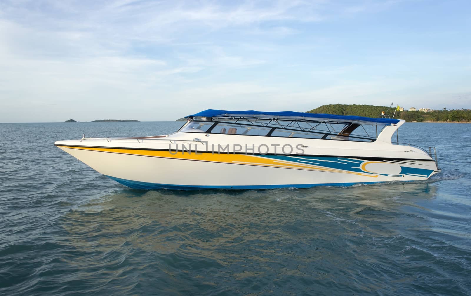 Boat - a speed boat on blue water